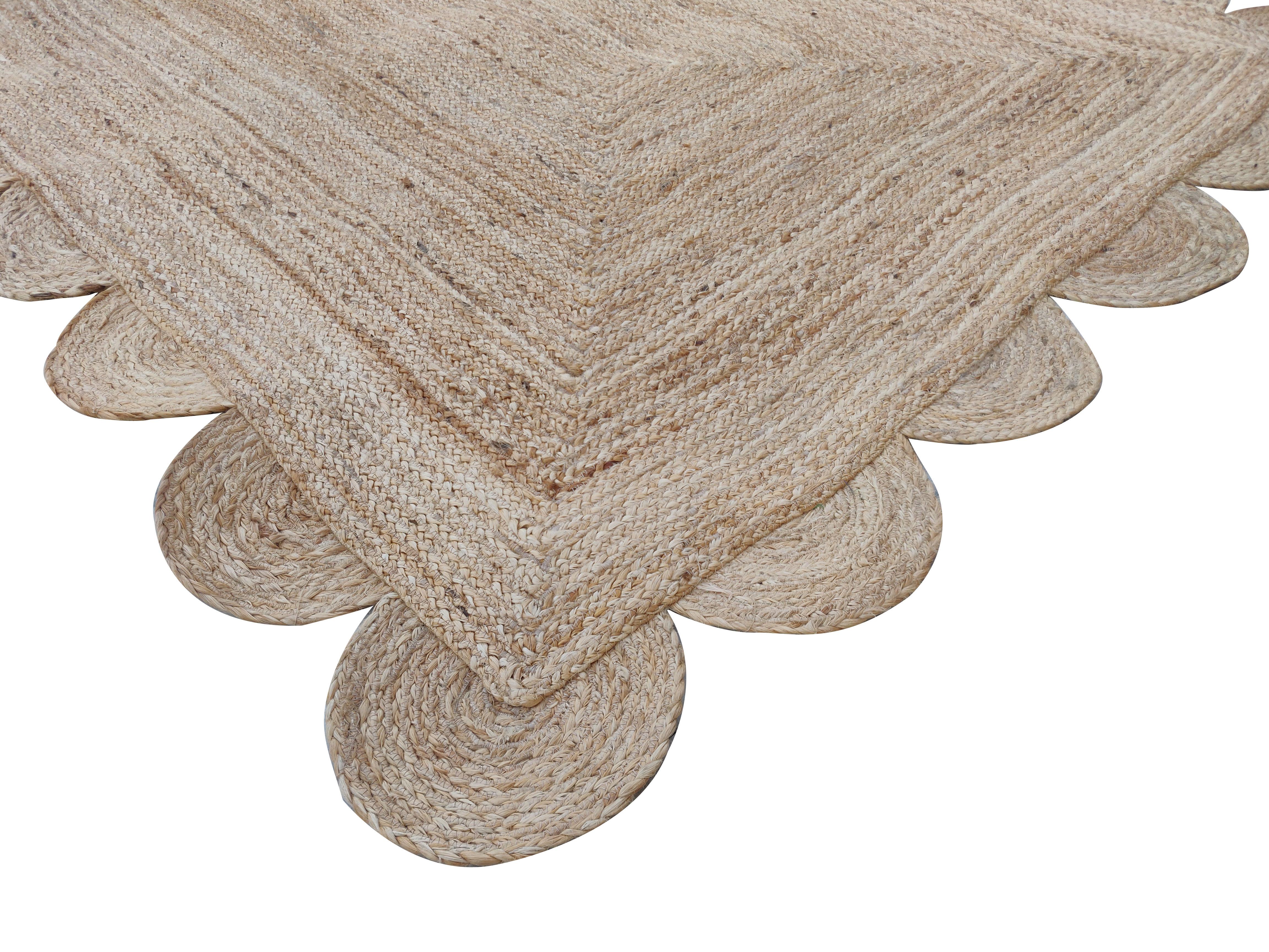 Handmade Jute Scalloped Rug, Natural Jute Dhurrie -4'x6'

These special flat-weave dhurries are hand-woven with 15 ply 100% cotton yarn. Due to the special manufacturing techniques used to create our rugs, the size and color of each piece may vary a