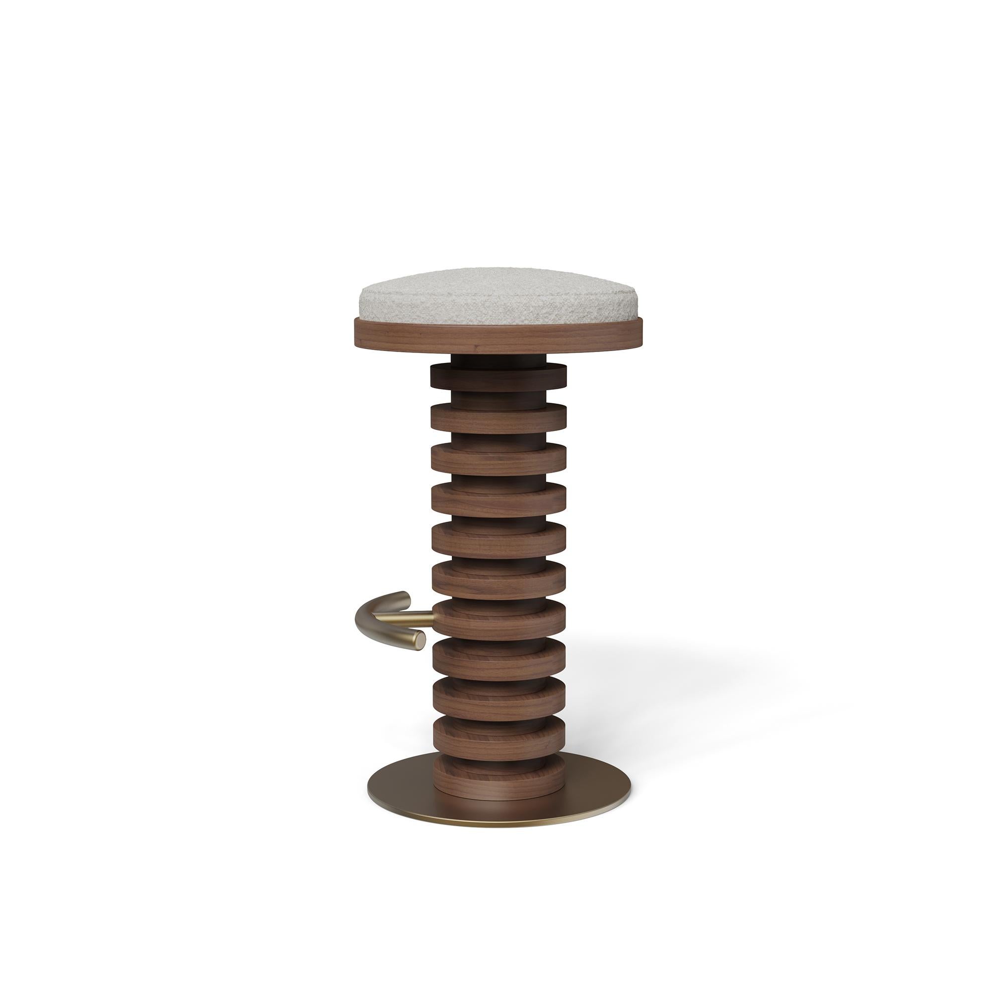 The Lola Bar Chair by Nolita Harbour is a statement piece of modern craftsmanship, combining innovative design with luxury materials. Featuring a sculptural walnut wood frame with layered circular detailing, the chair is anchored on a sturdy brass
