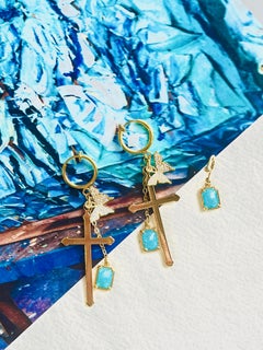 Pendientes de clip de oro con cristal en forma de cruz larga hechos a mano, con mariposas y zafiros azules