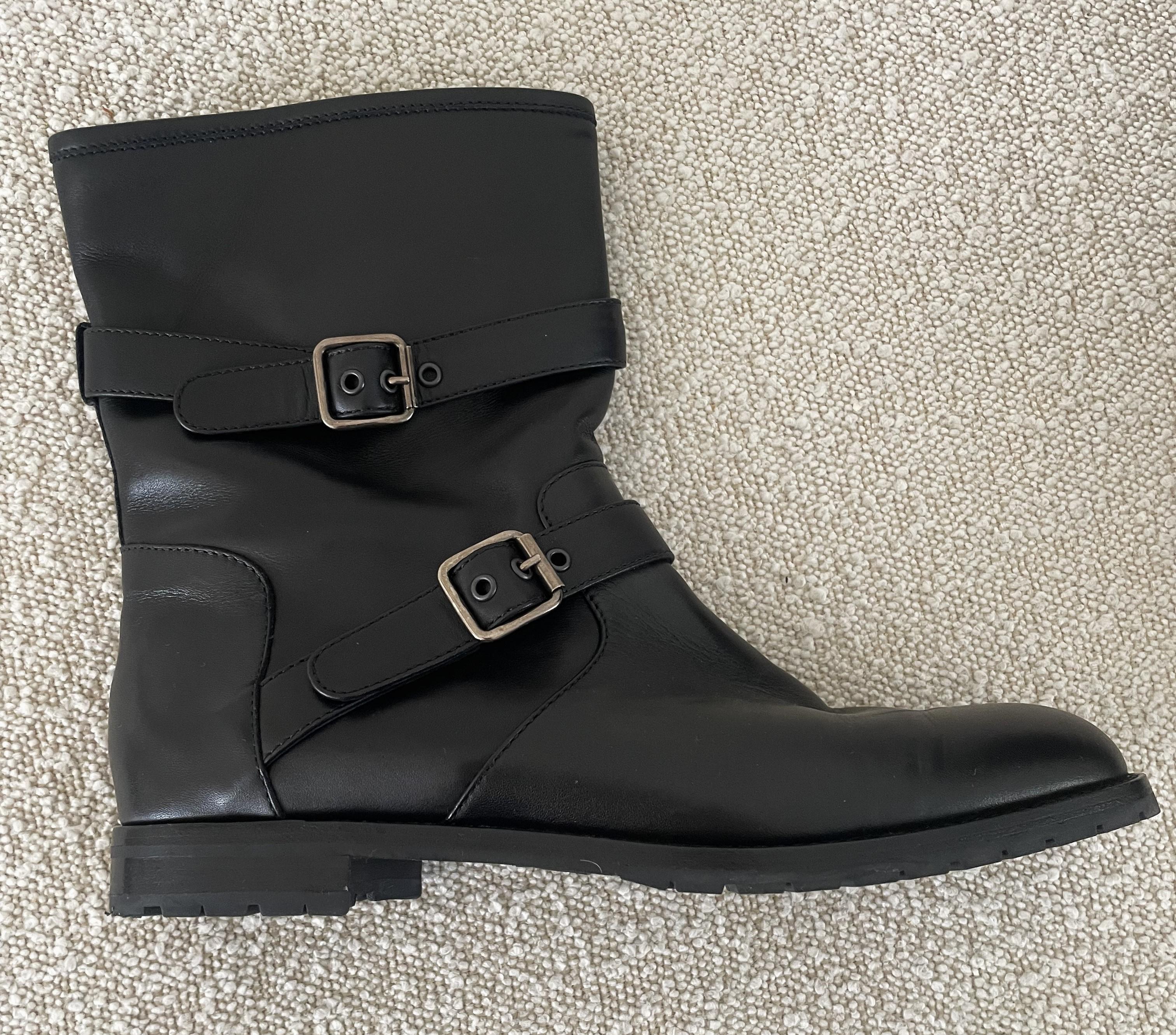 The Handmade Manolo Blahnik Sulaltra Calf Leather Biker Booties are a luxury footwear piece known for their high-quality craftsmanship and distinctive style. Manolo Blahnik is a renowned luxury shoe designer, famous for his elegant and innovative