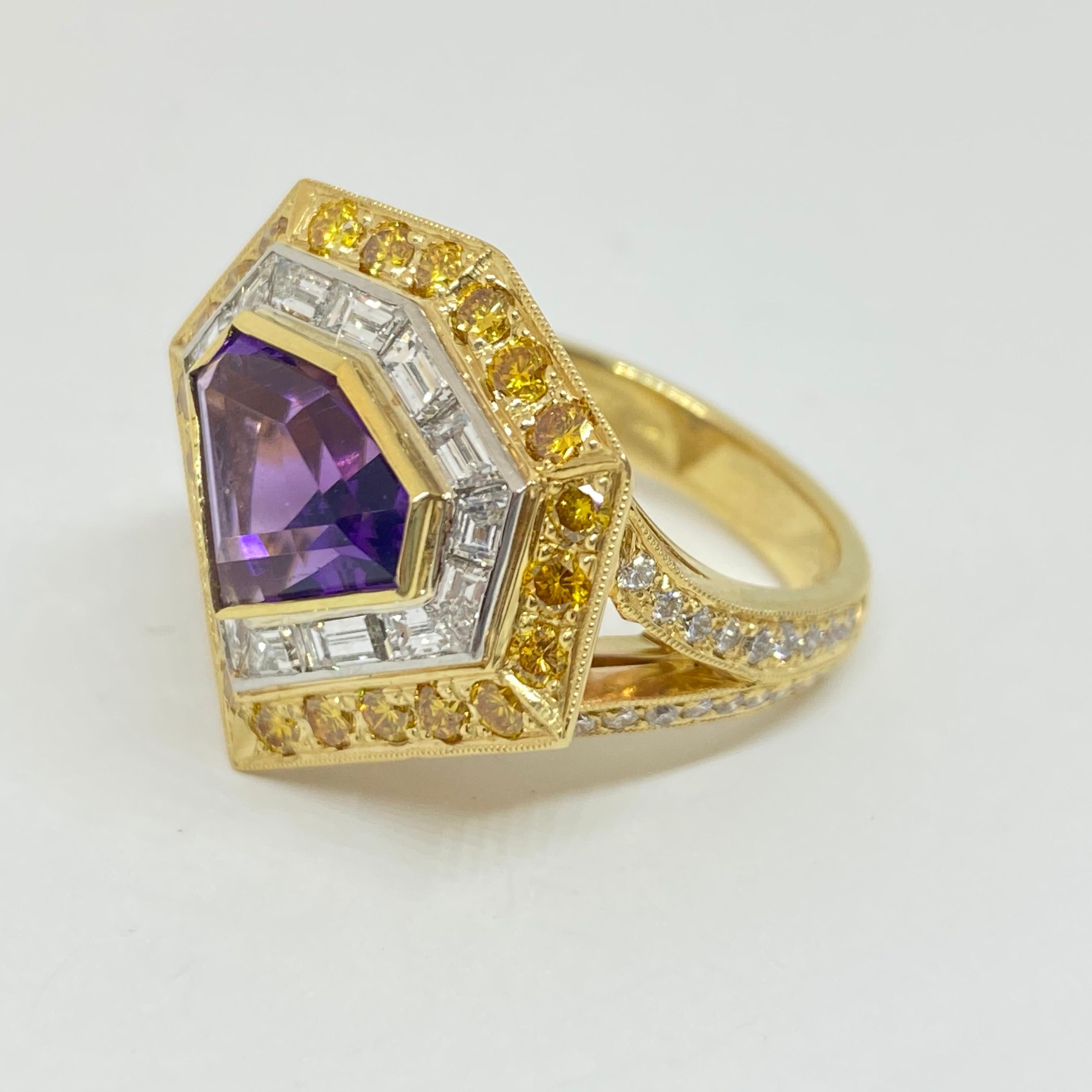 nique shield shaped kite Amethyst ring with double diamond halo.  The center kite shaped Amethyst is surrounded by 14 platinum channel set baguette diamonds weighing 1.40cts total. The diamond baguettes are surrounded by an additional halo of 22