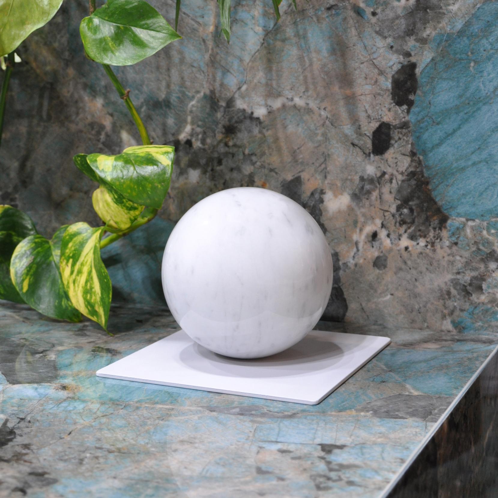 Metal paperweight with sphere in white Carrara, black Marquina, Portoro or Paonazzo marble in collaboration with Anime Design. Each piece is in a way unique (every marble block is different in veins and shades) and handmade by Italian artisans