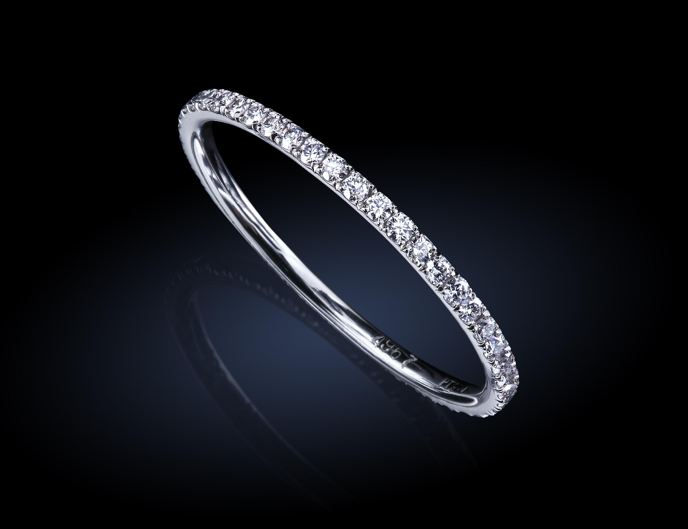 Leon Mege exclusive Le Coeur™ platinum wedding band 1.5 mm wide. 
The total diamond weight is approximately 0.4 carats. The total weight depends on the actual finger size.
All stones are F/VS ideal cut diamonds. 
All blanks for our bands are