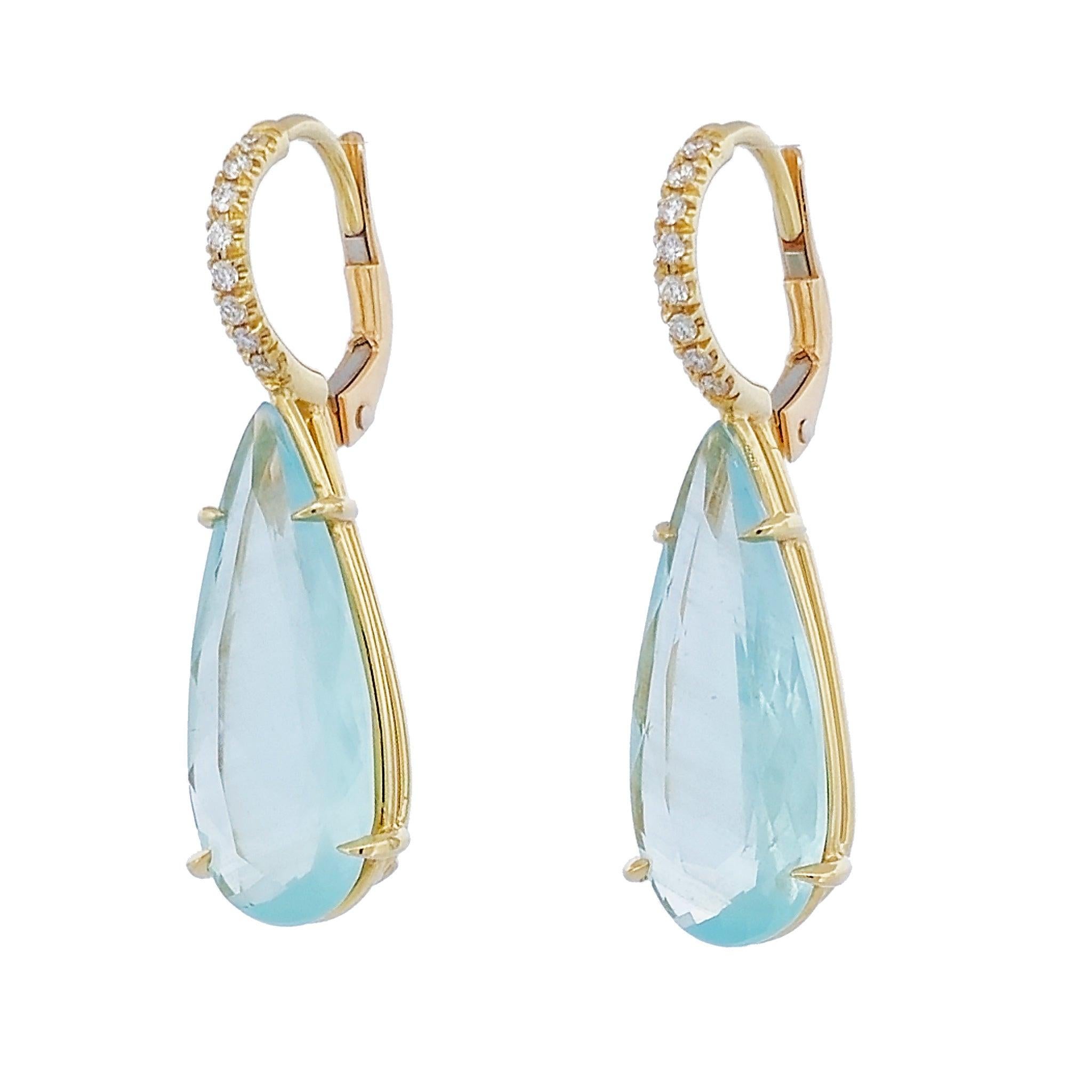 This exquisite pair of drop earrings feature natural milky aquamarine stones of 8.39ct weight, along with 16 pieces of diamond pave up the bail of 0.12ct each, F/G VS1 clarity. Handcrafted by the H&H Collection in 18kt yellow gold.
Natural Milky