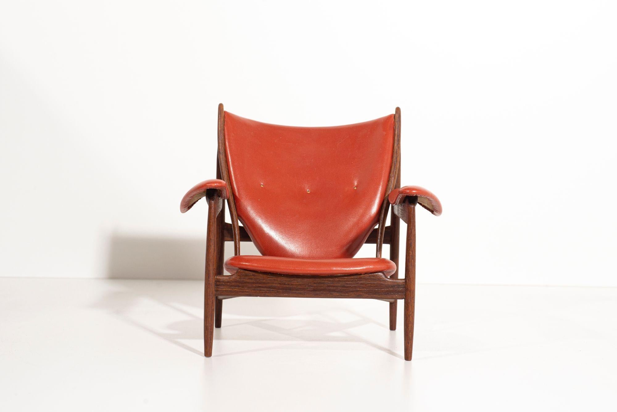 Handmade Miniature of Finn Juhl’s Chieftain Chair
Handcrafted by Norimitsu Takahashi  Nori Art Handicrafts Workshop, Japan, 2000s
A meticulous miniature of Finn Juhl’s Chieftain Chair, handcrafted in wood and leather by Japanese master miniaturist