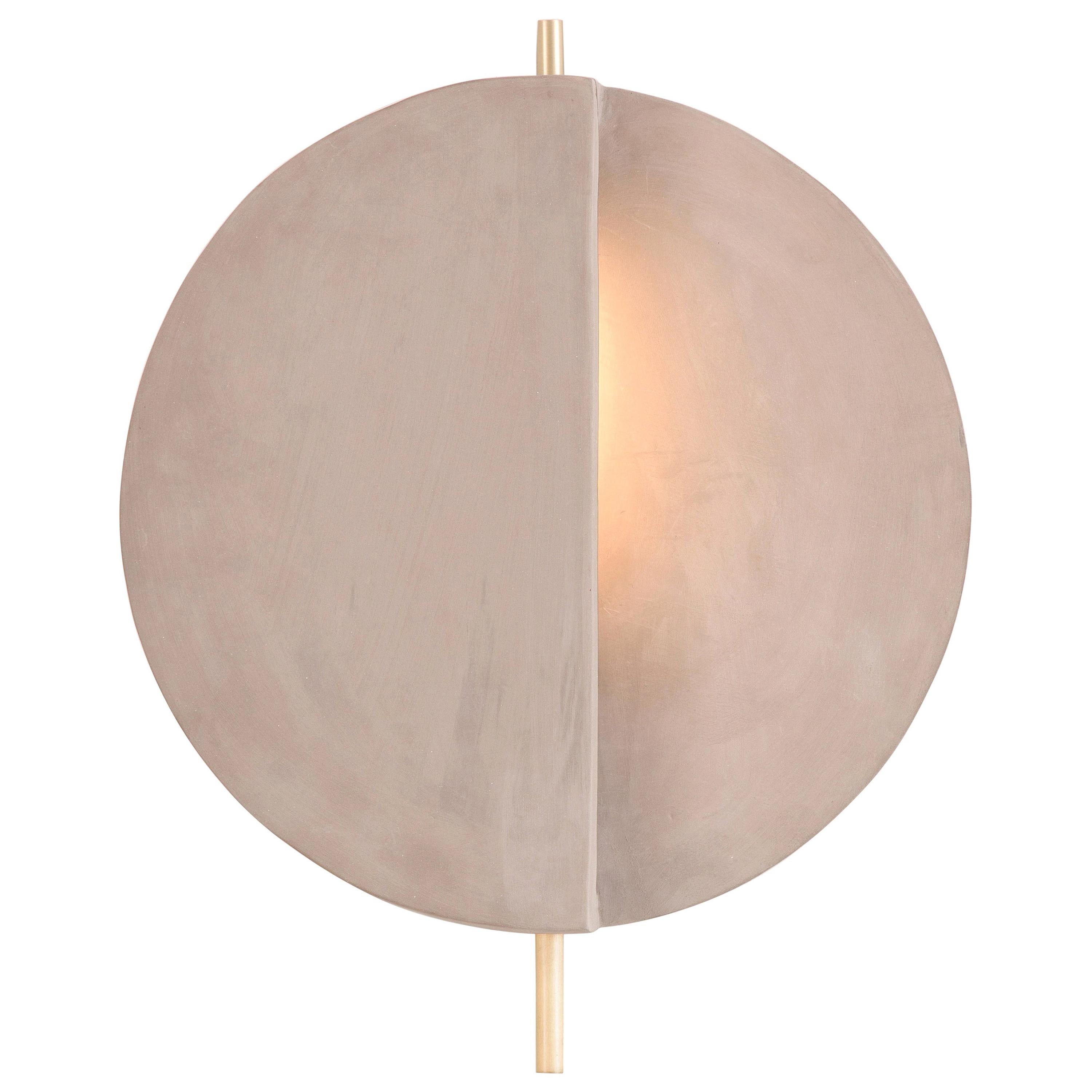 Handmade Minimalist Geometric wall light enhances the beauty of slowliness into daily process and the raw beauty of Brazil's natural landscapes. 
 
85g is our raw minimalist wall light, handmade and inspired by the serene beauty of Brazil's