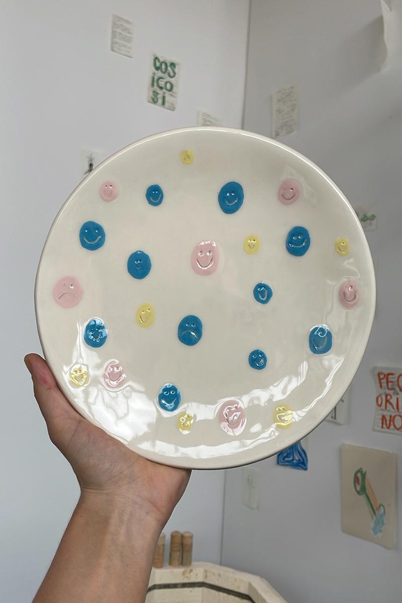 One of a kind hand-painted dinner plate specially designed to enliven and enrich your table setting and home. Perfect for everyday use, this fun and functional plate has an unmistakable handmade feel and may equally be used as a serving dish.