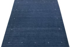 Tapis moderne en laine bleue de style Gabbeh fait à la main avec motif minimaliste
