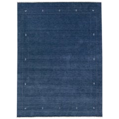 Handmade Modern Gabbeh Style Blue Wool Rug with Minimalist Motif