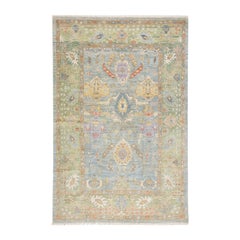 Handgefertigter moderner blauer und grüner Wollteppich im Oushak-Stil mit Blumenmotiv