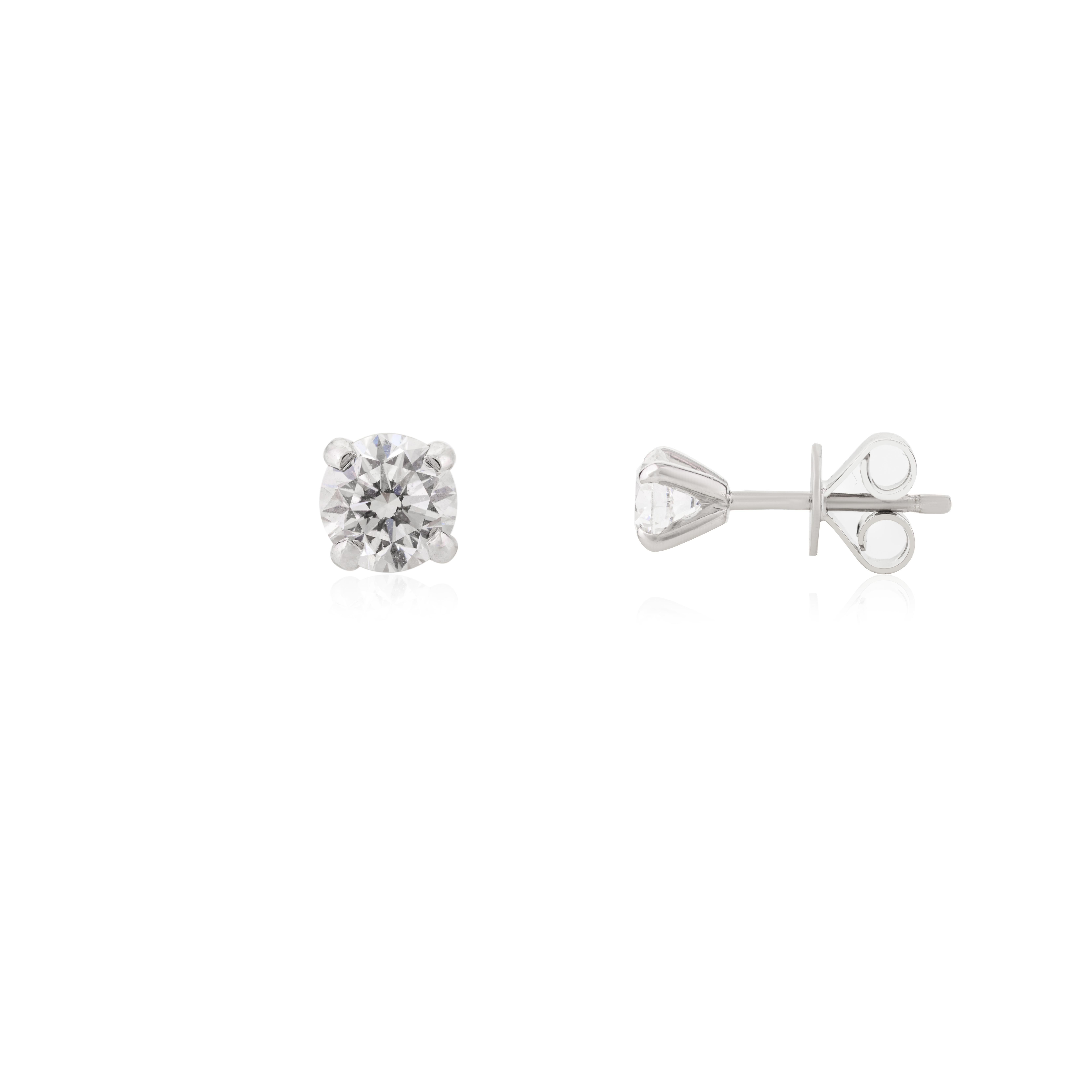 Handmade Moissanite Round Cut Stud Earring in 14k solid white gold. You shall need these stud earrings to make a statement with your look. These Moissanite stud earrings create a sparkling, luxurious look featuring 0.31 carats of