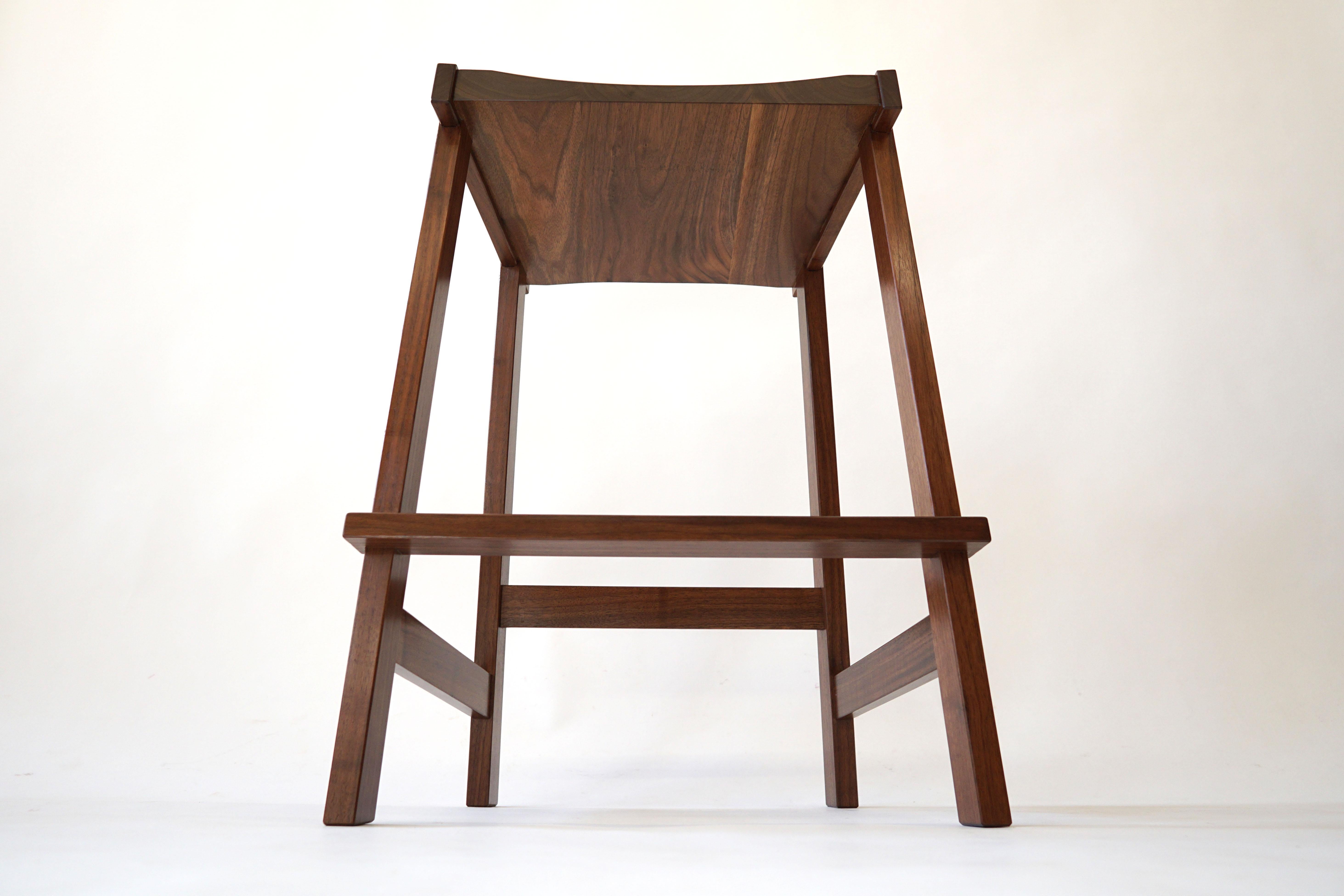 Contemporary Montrose Stool in Walnut, Exposed Joinery with a Hand Carved Seat For Sale