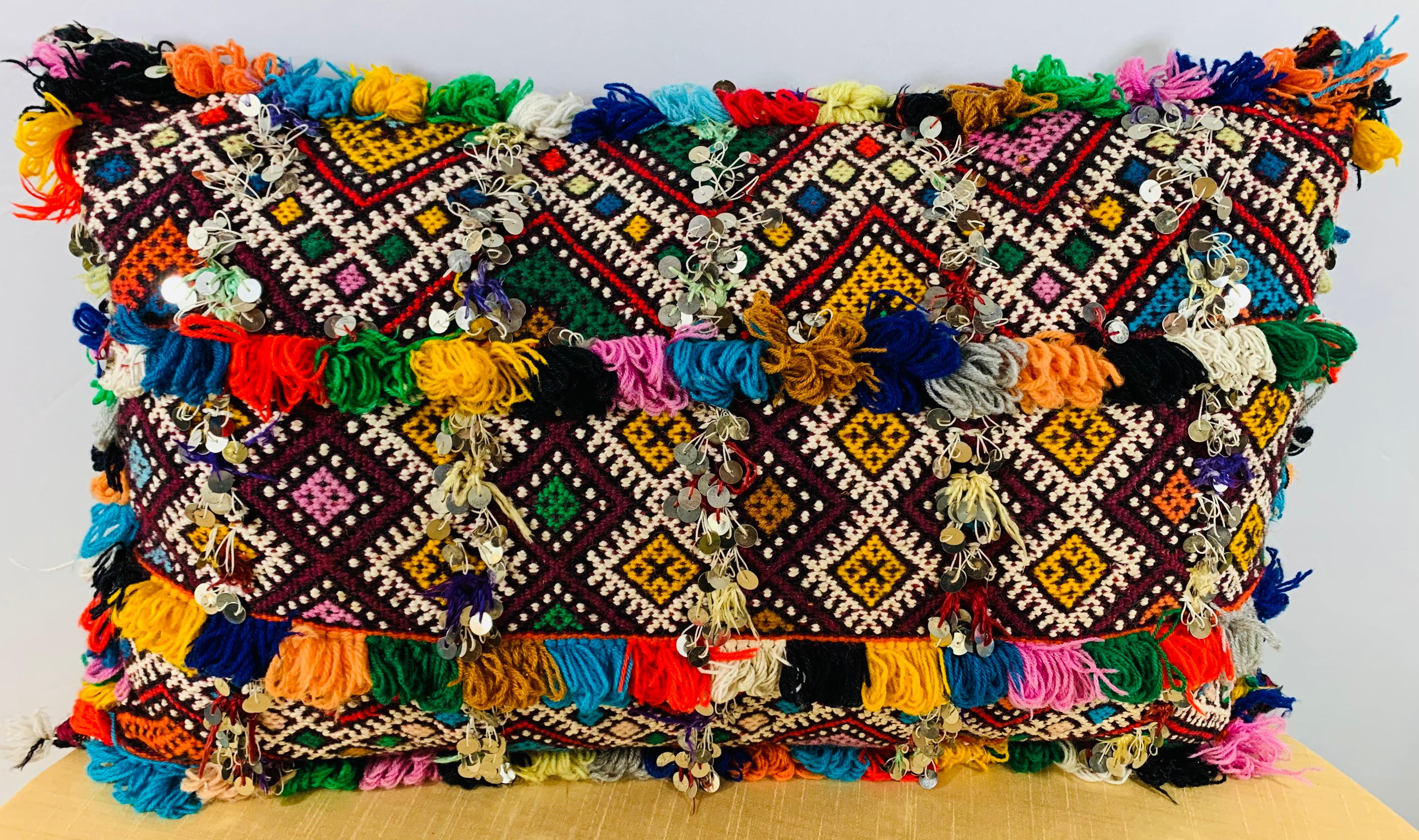 Handwoven by Berber women using high-quality wool
Made using vintage fabrics and featuring unique color schemes
Boasts magnificent Berber geometrical patterns and lovely fringe work

Size: 24.5