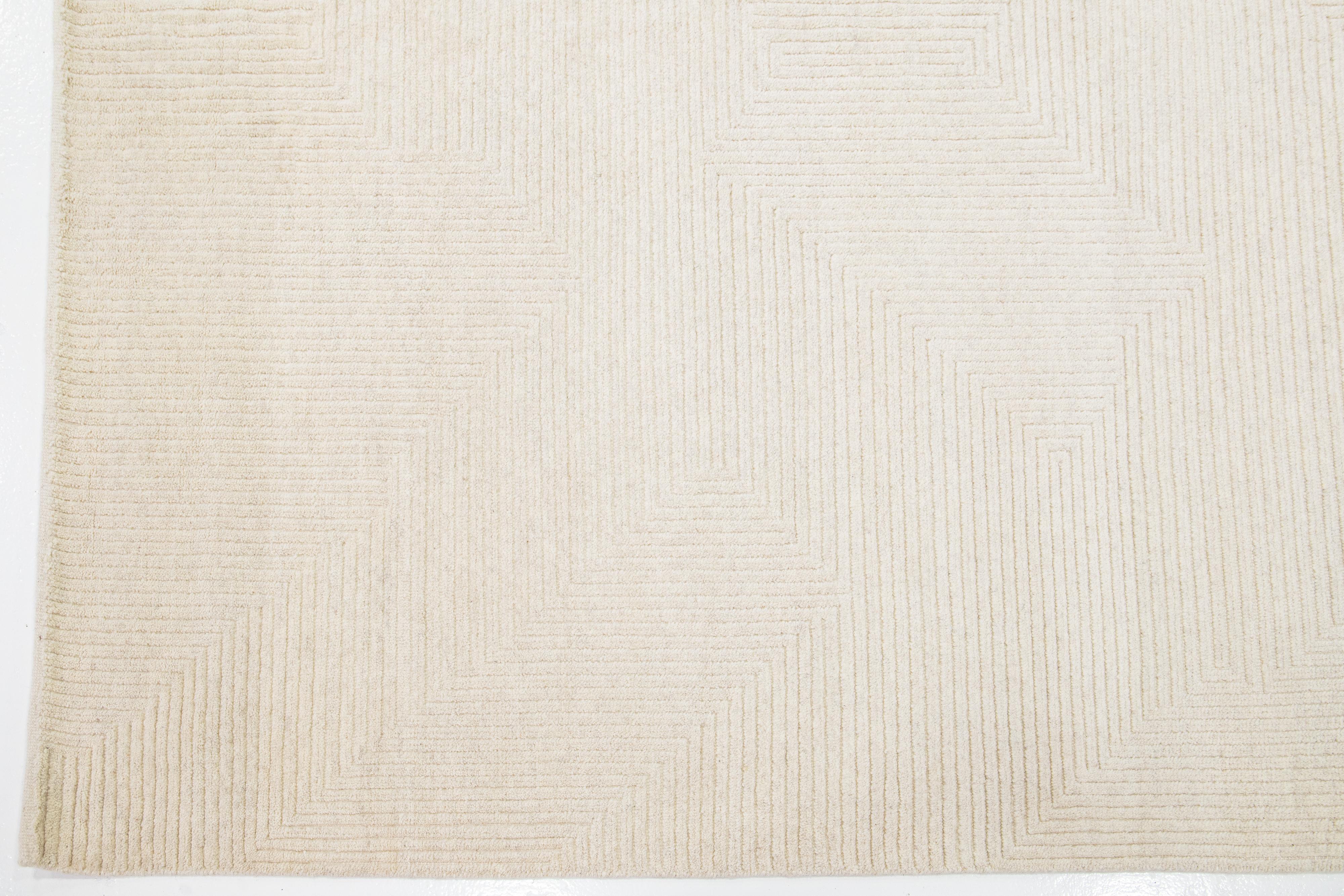 Hand-Knotted Handmade Moroccan Style Beige Wool Rug With Minimalist Design For Sale