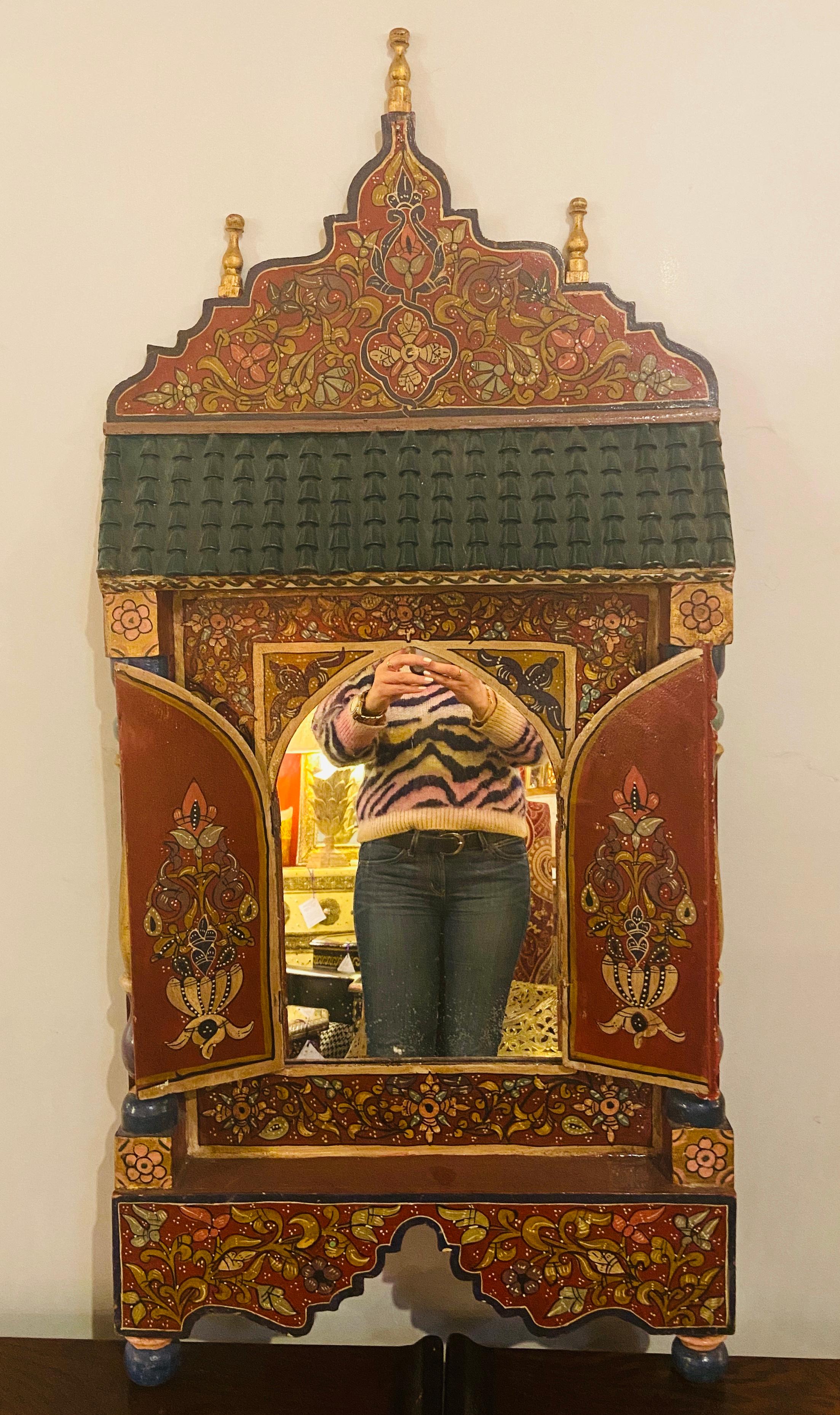 Beautiful vintage two doors mirror featuring Moucharabeih traditional hand-paint design with lovely details and warm colors. This mirror will be a perfect addiction to your hallway, bedroom or living room.