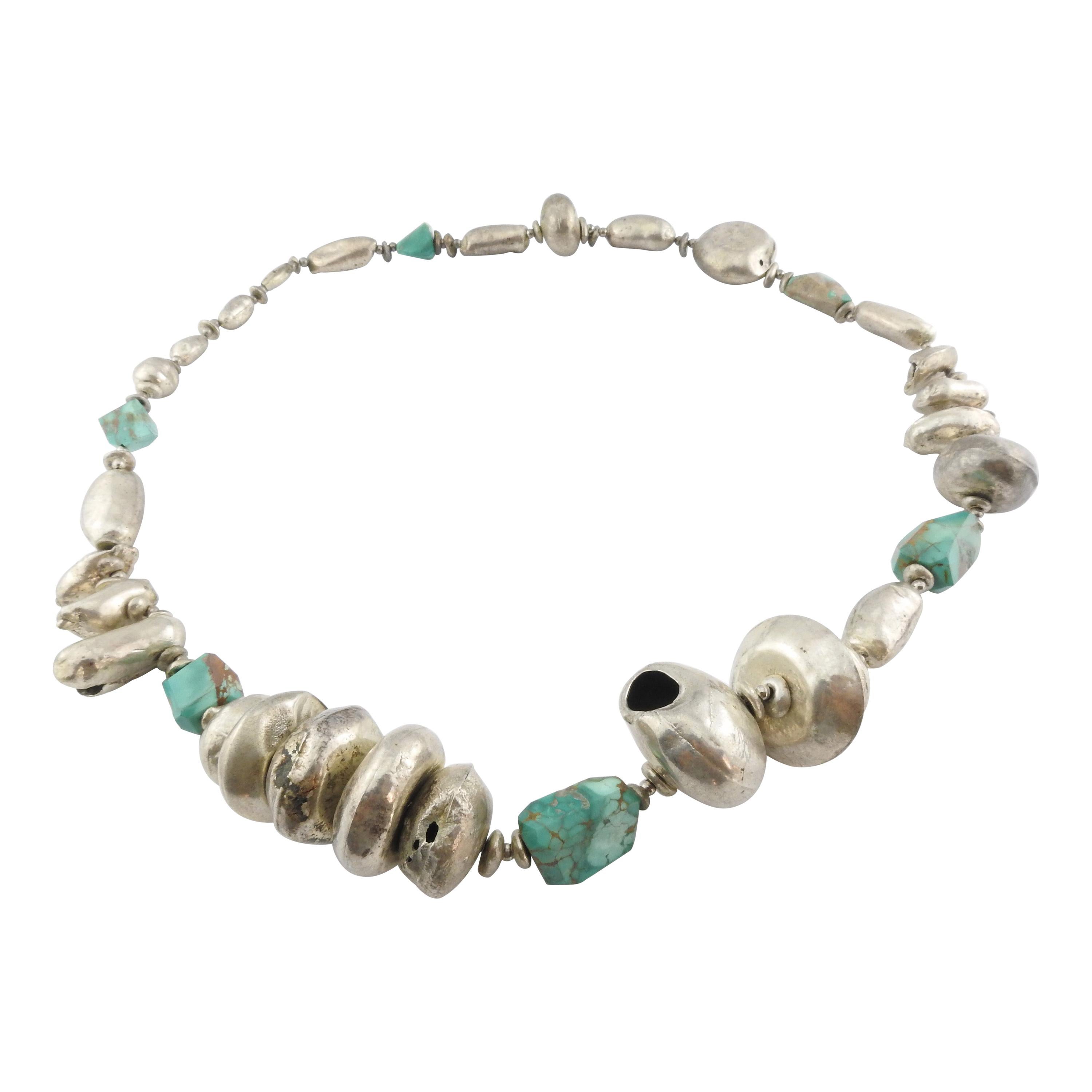 Handmade Native American Silver Puffy Hollow Bead and Turquoise Chunk Necklace For Sale