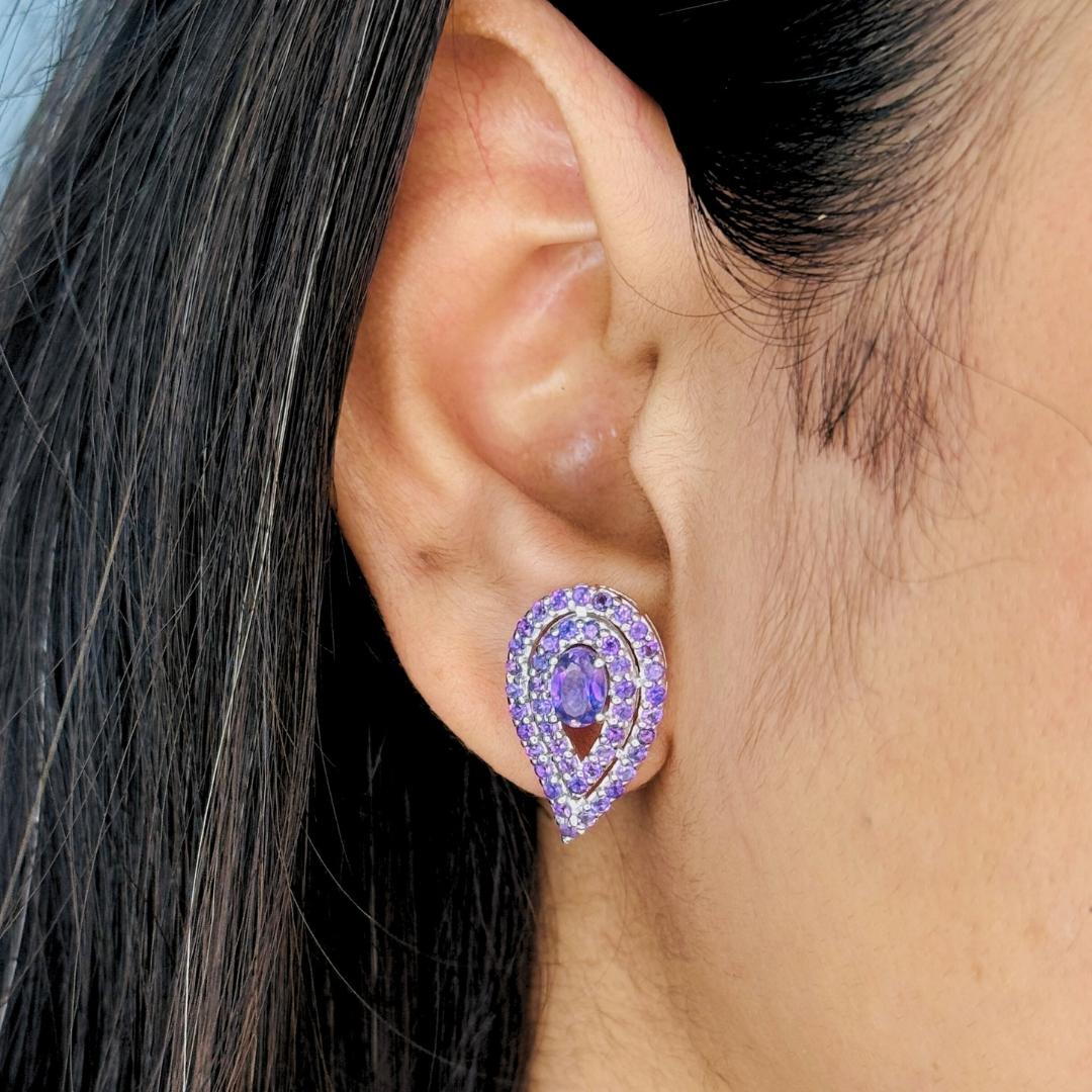 Natural Amethyst Reversed Pear Stud Earrings in sterling silver to make a statement with your look. You shall need stud earrings to make a statement with your look. These earrings create a sparkling, luxurious look featuring oval, round cut natural