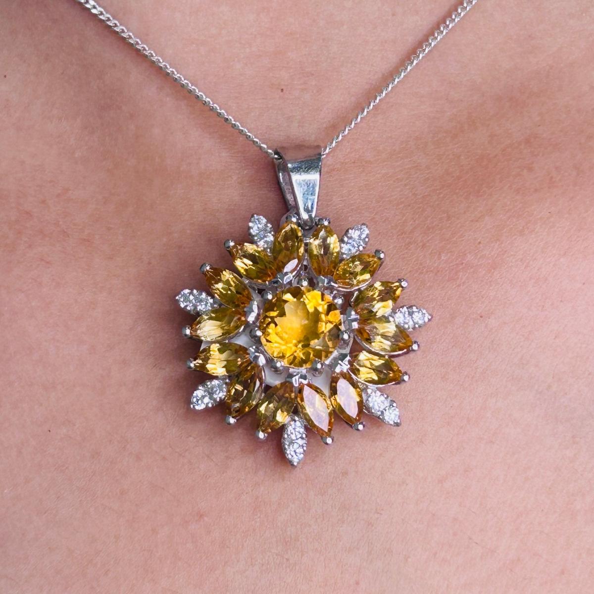 Natural Citrine Flower Halo Pendant Necklace in sterling silver studded with round cut citrine. This stunning piece of jewelry instantly elevates a casual look or dressy outfit.
Citrine enhances the intellectual capacity of the person.
Designed with