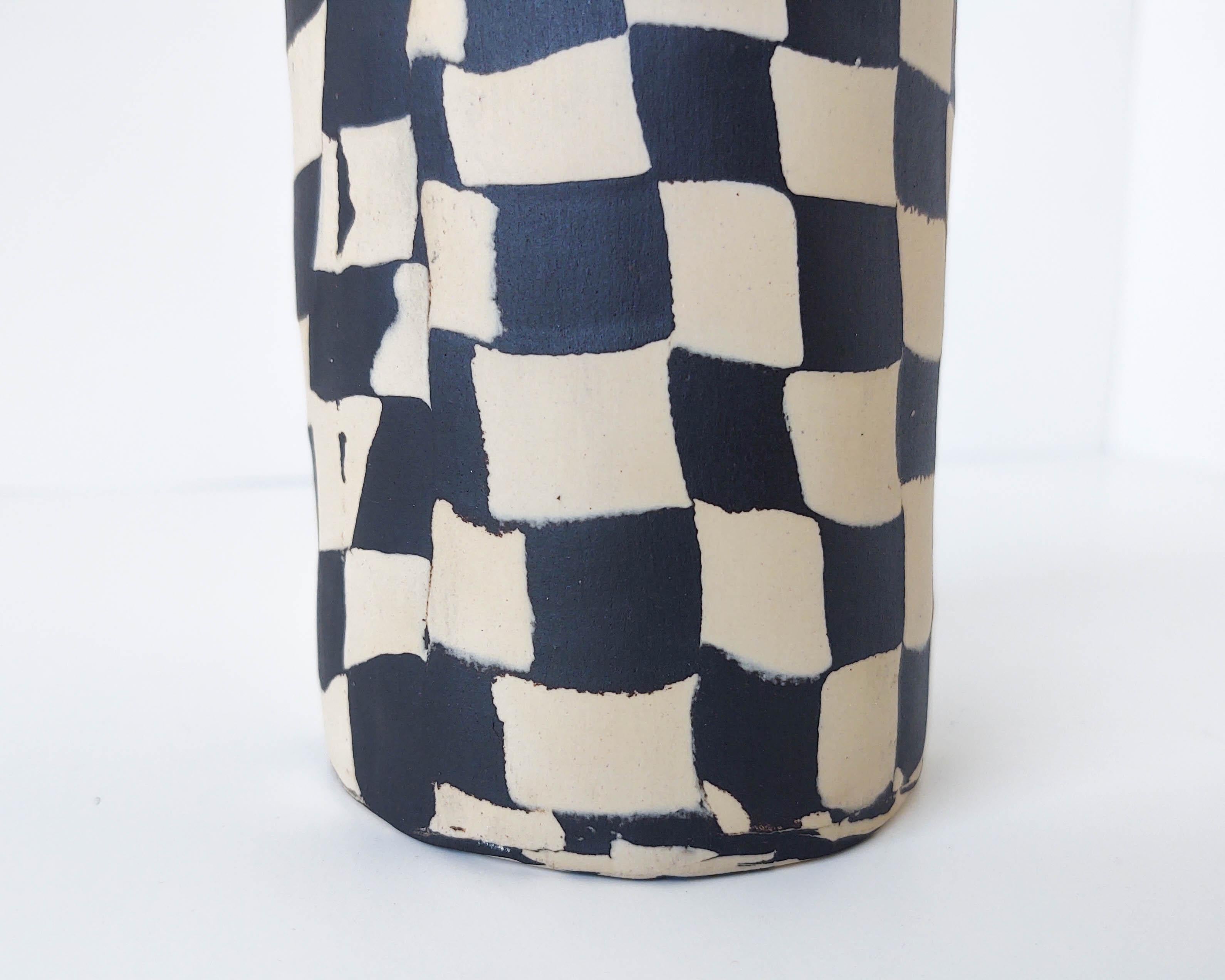black and white checkered pottery