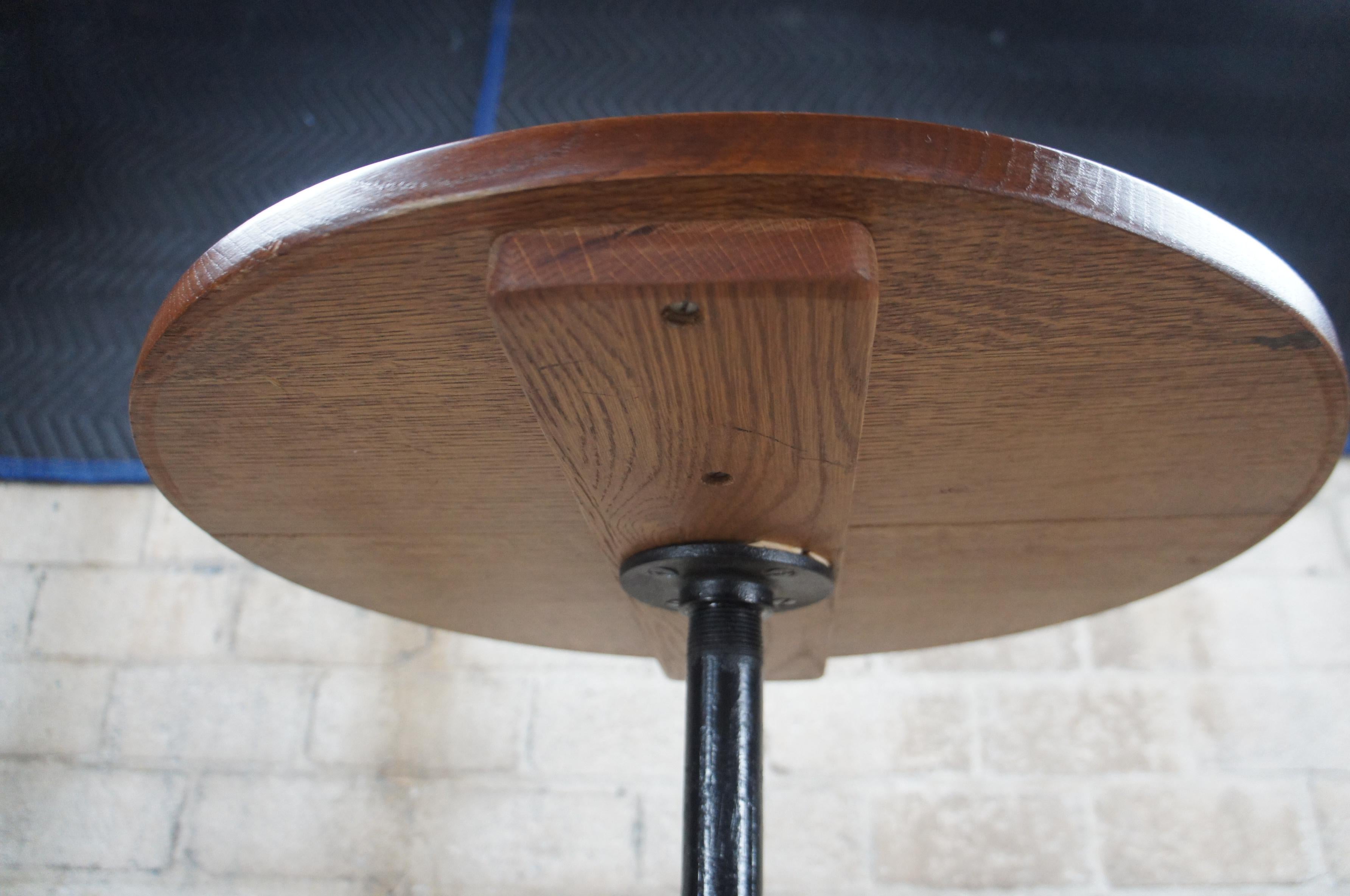 Handmade Oak Industrial Reclaimed Cast Iron Wagon Wheel Pitchfork Bistro Table For Sale 2