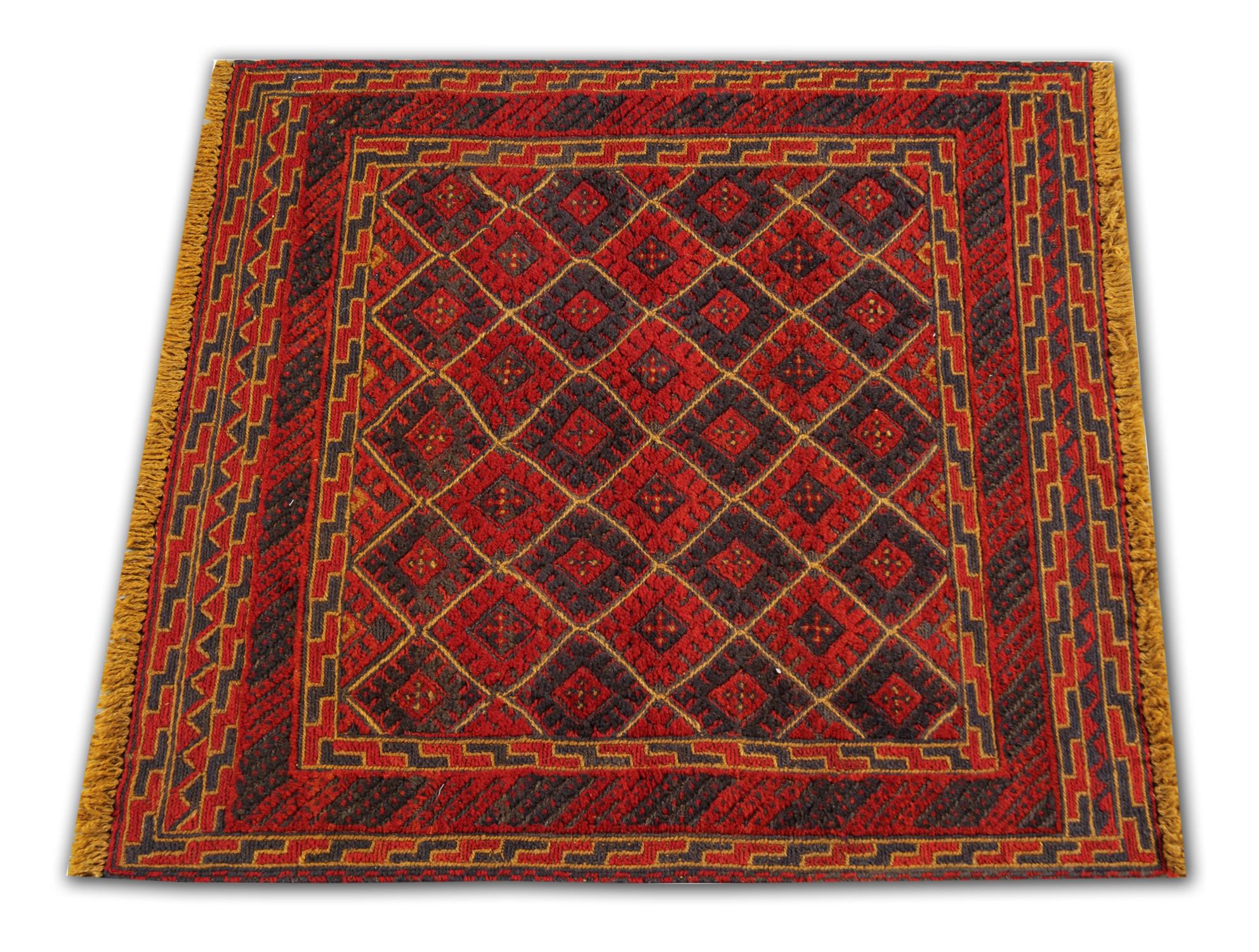 This is an example of a fine Afghan rug made by highly skilled Turkman weavers in the north of Afghanistan, known for their fine handmade rugs. They have used hand-spun wool and 100% organic dyes for the production of these wool rugs. This tribal