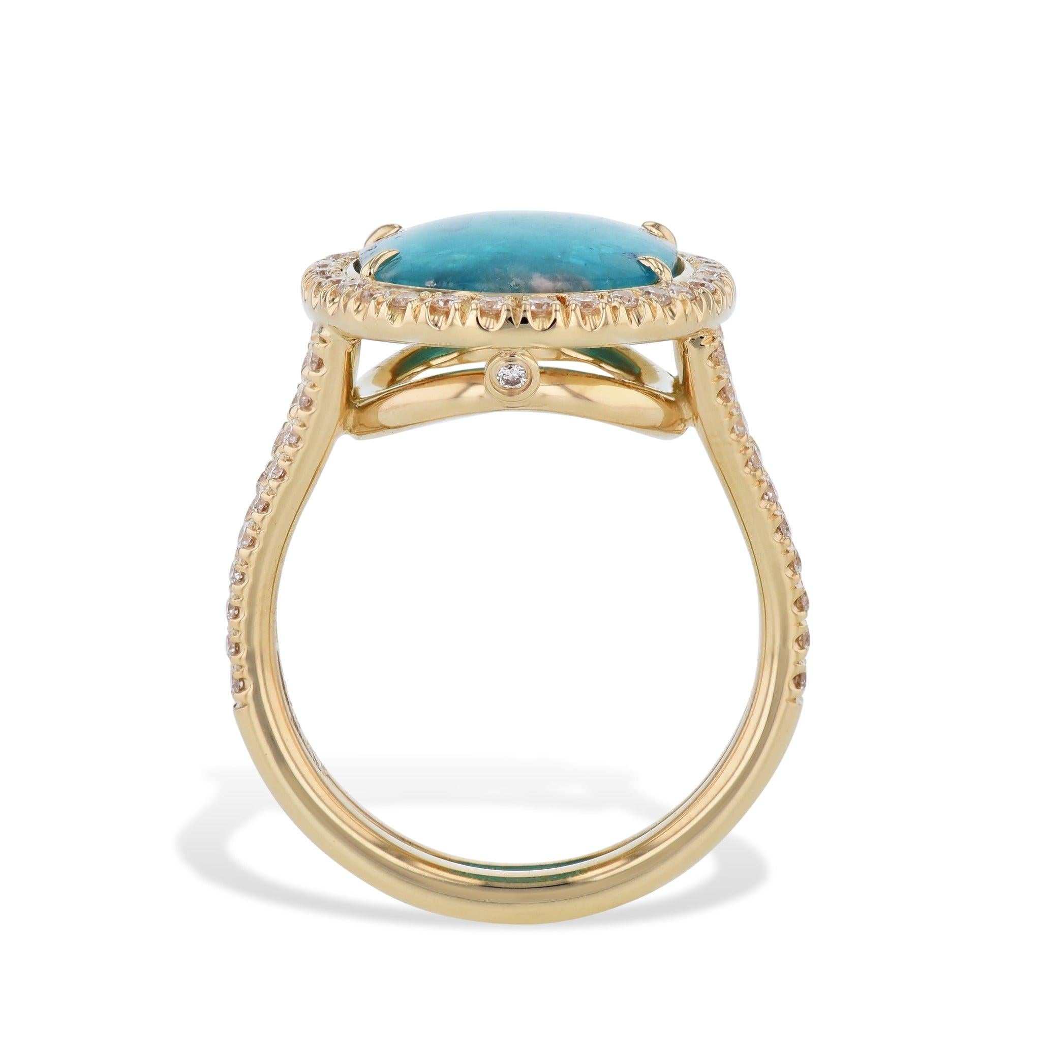 Feel inspired every time you slip on this 18kt Yellow Gold HH Collection Ring. Flaunting a gorgeous Oval Paraiba Tourmaline Cabochon, embraced in a sparkling halo of diamons, flowing along the split shank. An exquisite size 6.5 masterpiece, crafted