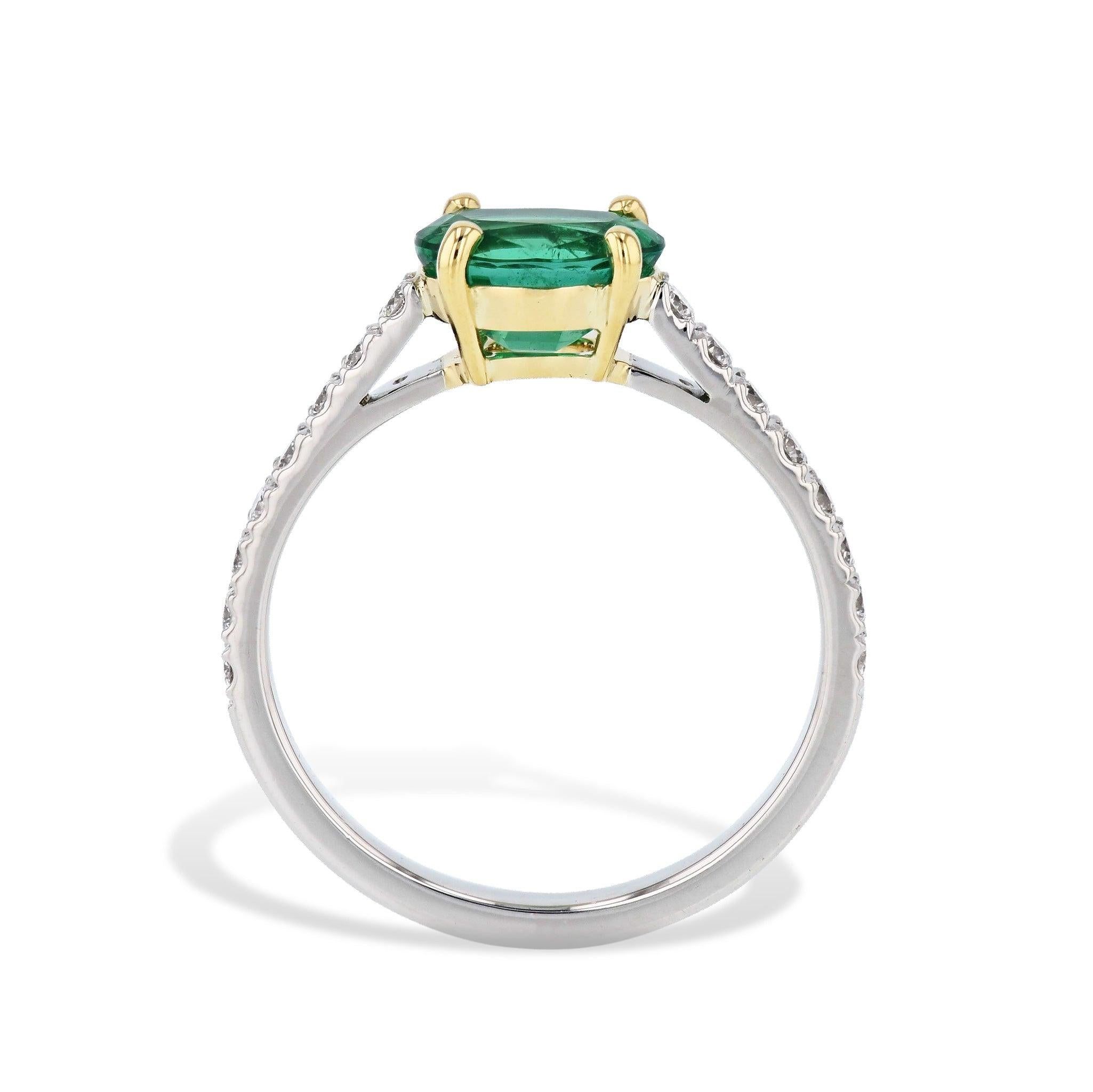 Get ready to be dazzled by this stunning Oval Zambian Emerald Platinum Yellow Gold Ring, featuring an oval cut Zambian emerald of fine quality and accented with diamonds down the shank. Handmade with love and care, this piece from the H&H Collection