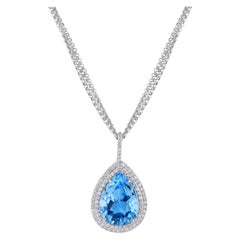 Ciondolo a goccia con diamante e topazio blu a forma di pera fatto a mano