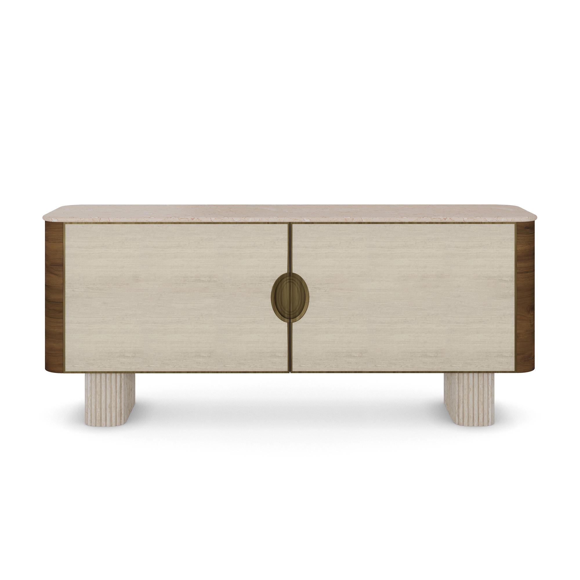 The Perrine Sideboard by Nolita Harbour merges premium materials with a timeless silhouette, offering both sculptural beauty and practical storage. Anchored by its ribbed travertine legs—crafted from honed stone with a matte finish for understated