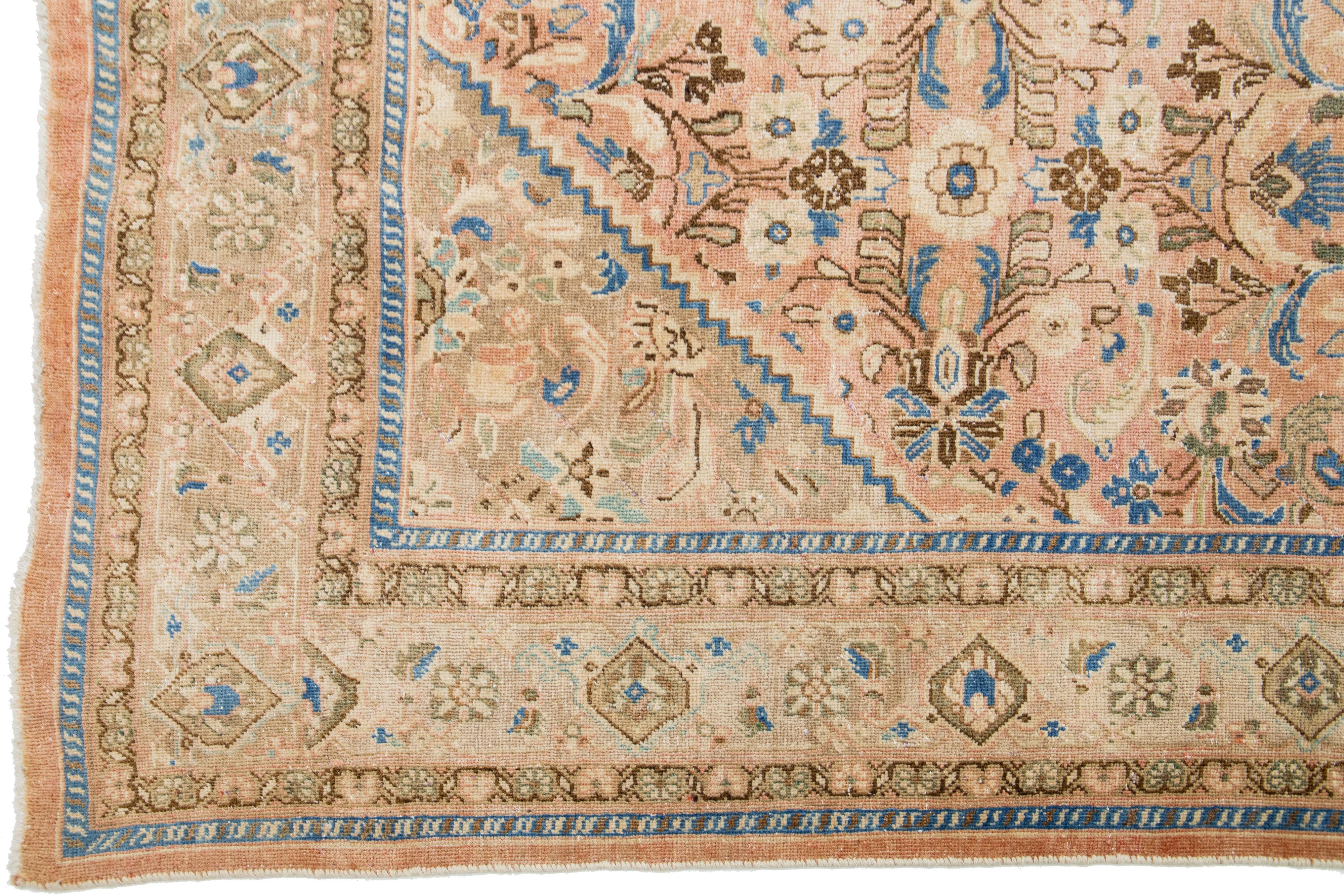 Handmade Persian Mahal Peach Wool Rug Featuring an Allover Floral Motif In Good Condition For Sale In Norwalk, CT