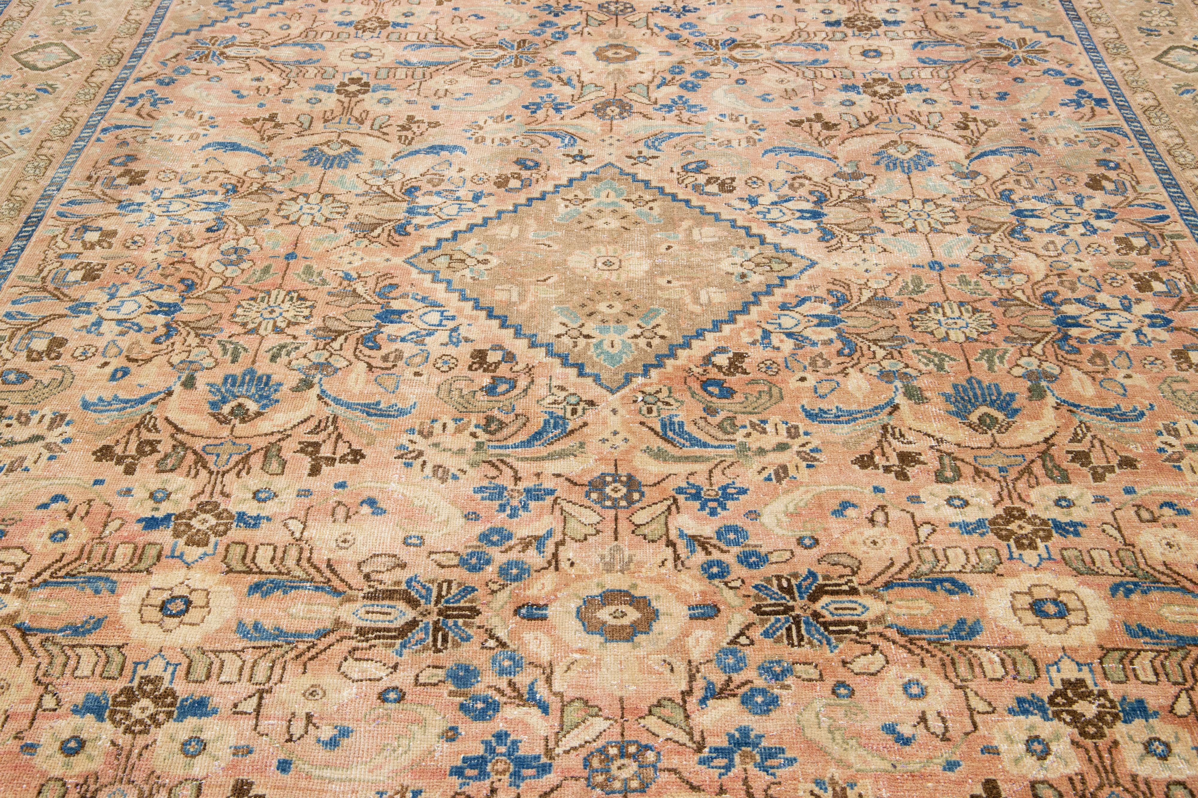 20th Century Handmade Persian Mahal Peach Wool Rug Featuring an Allover Floral Motif For Sale