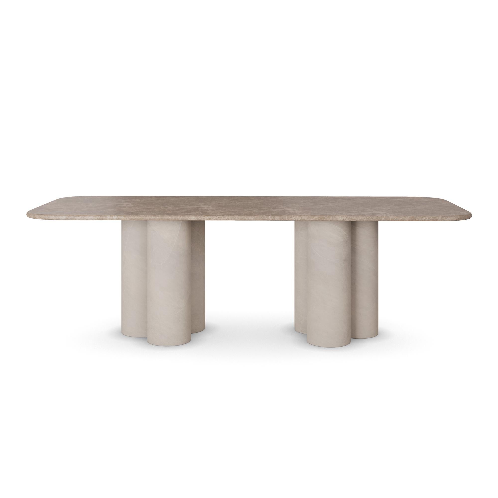 Il tavolo da pranzo Petra di Nolita Harbour è un capolavoro di design contemporaneo, realizzato per dare un senso di eleganza senza tempo al tuo spazio da pranzo. Questo lussuoso tavolo è stato progettato con un'attenzione particolare al