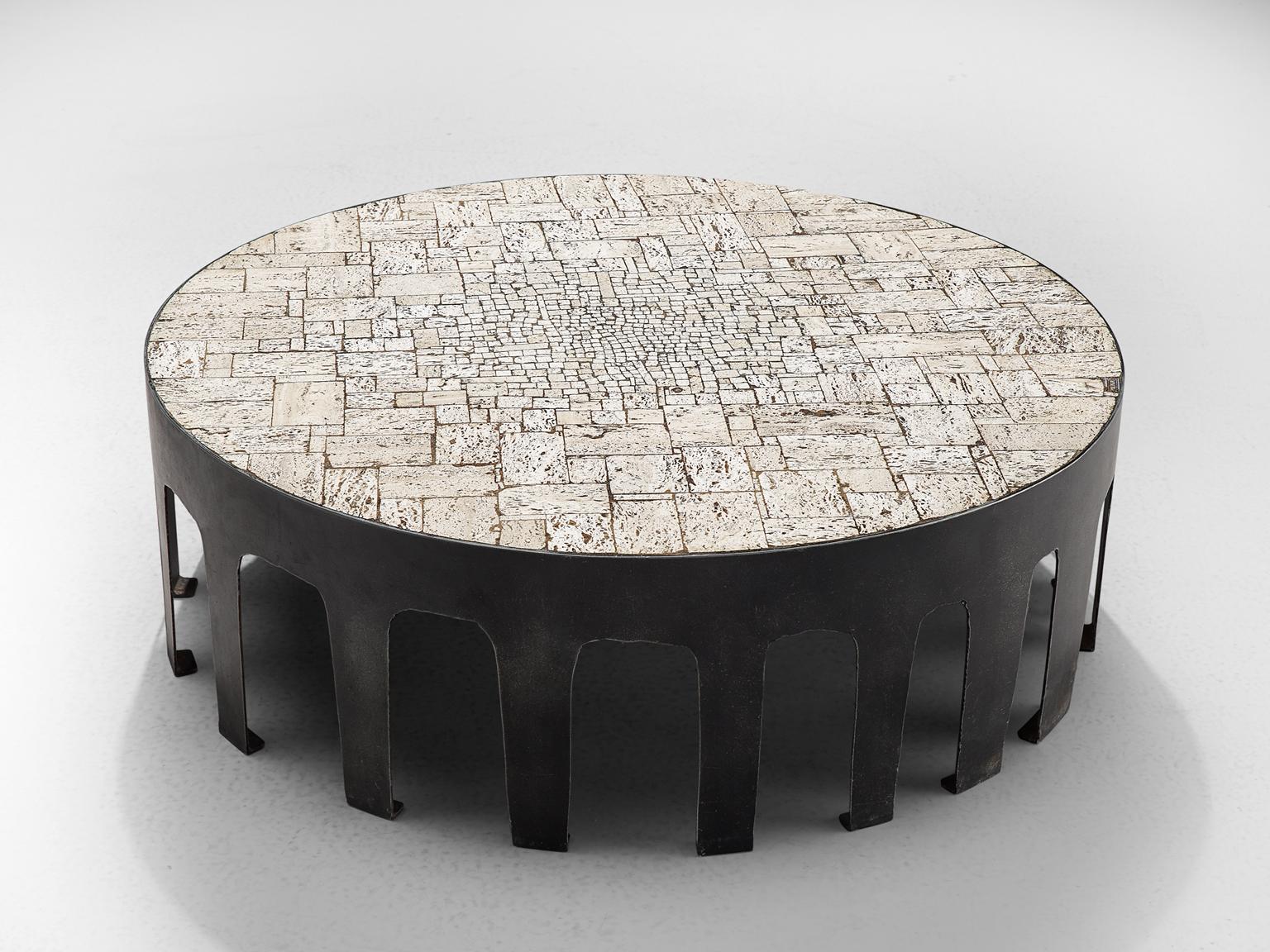Pia Manu, steel and travertine coffee table, Belgium, 1960.

This unique, hand made piece with cut metal frame designed in the workshop of Pia Manu. The frame was made with several legs and subsequently inlayed with travertine. The combination of