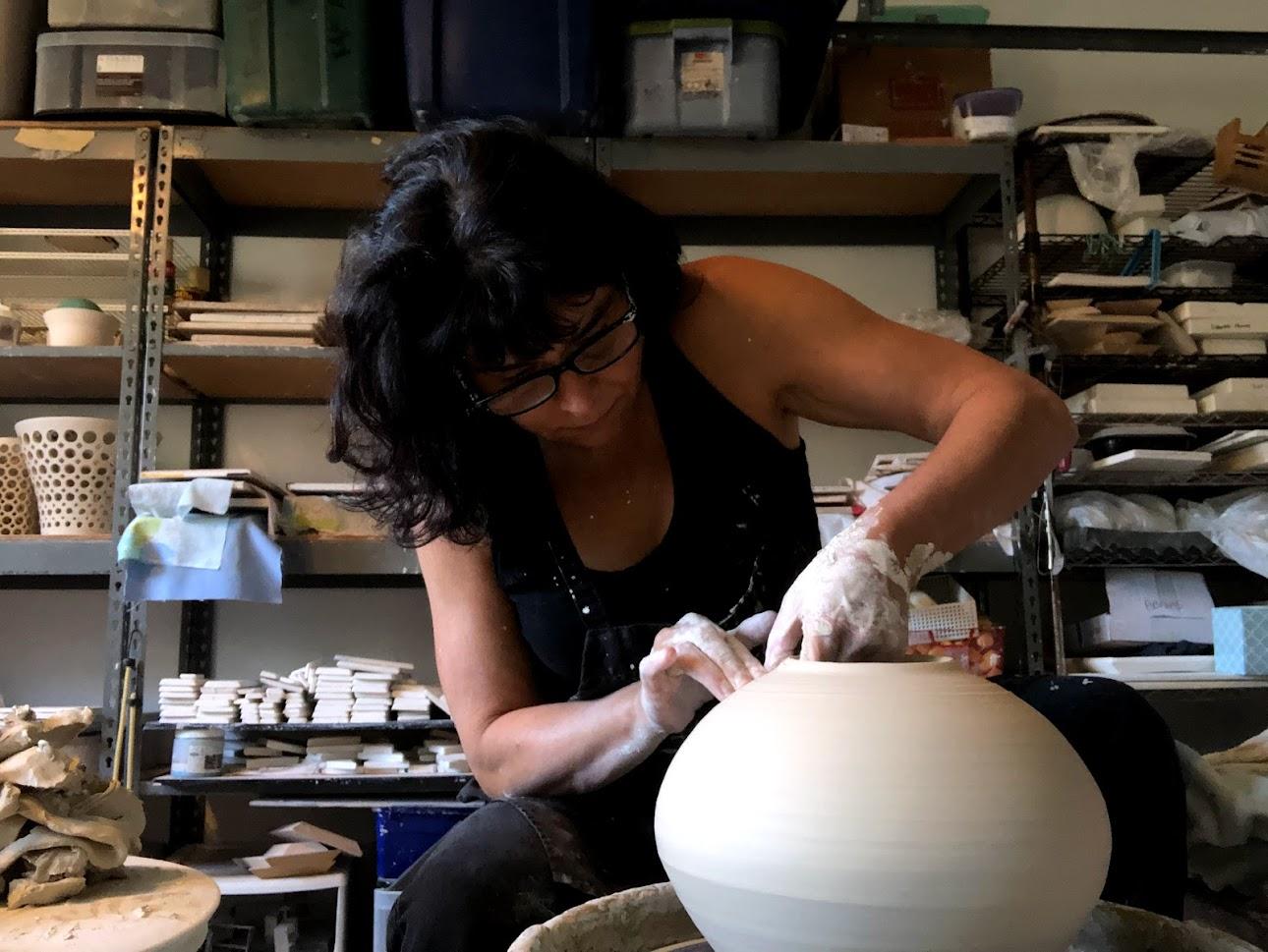 Mid-Century Modern Handmade Pierced Ceramic Orb with Variegated Crystaline Glaze For Sale