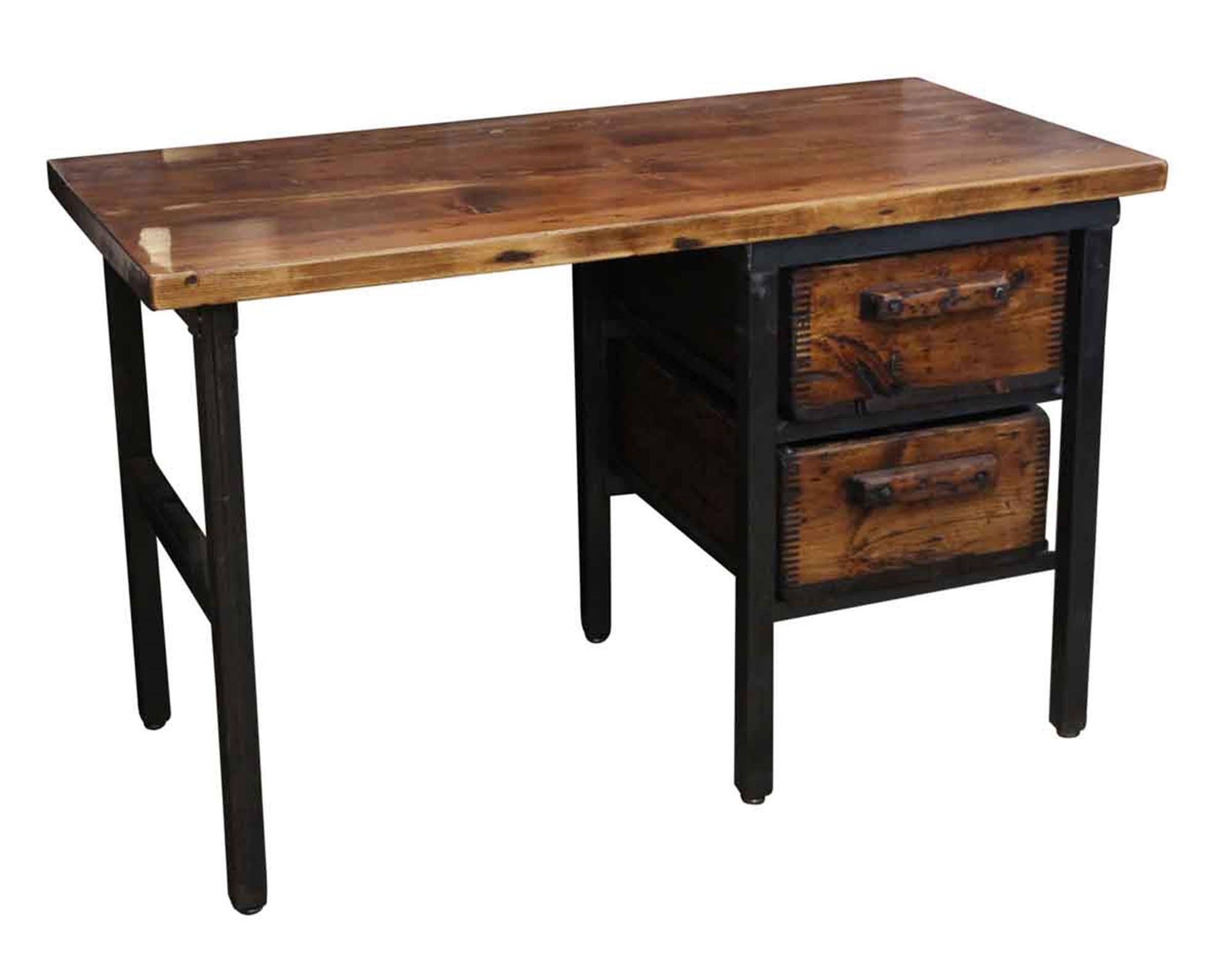 Manufactured by Olde good things, this desk is made using reclaimed old growth pine and salvaged wood bins from a New England tool company, all custom fit in a black steel frame. Please note since each desk is custom built, each desk varies slightly