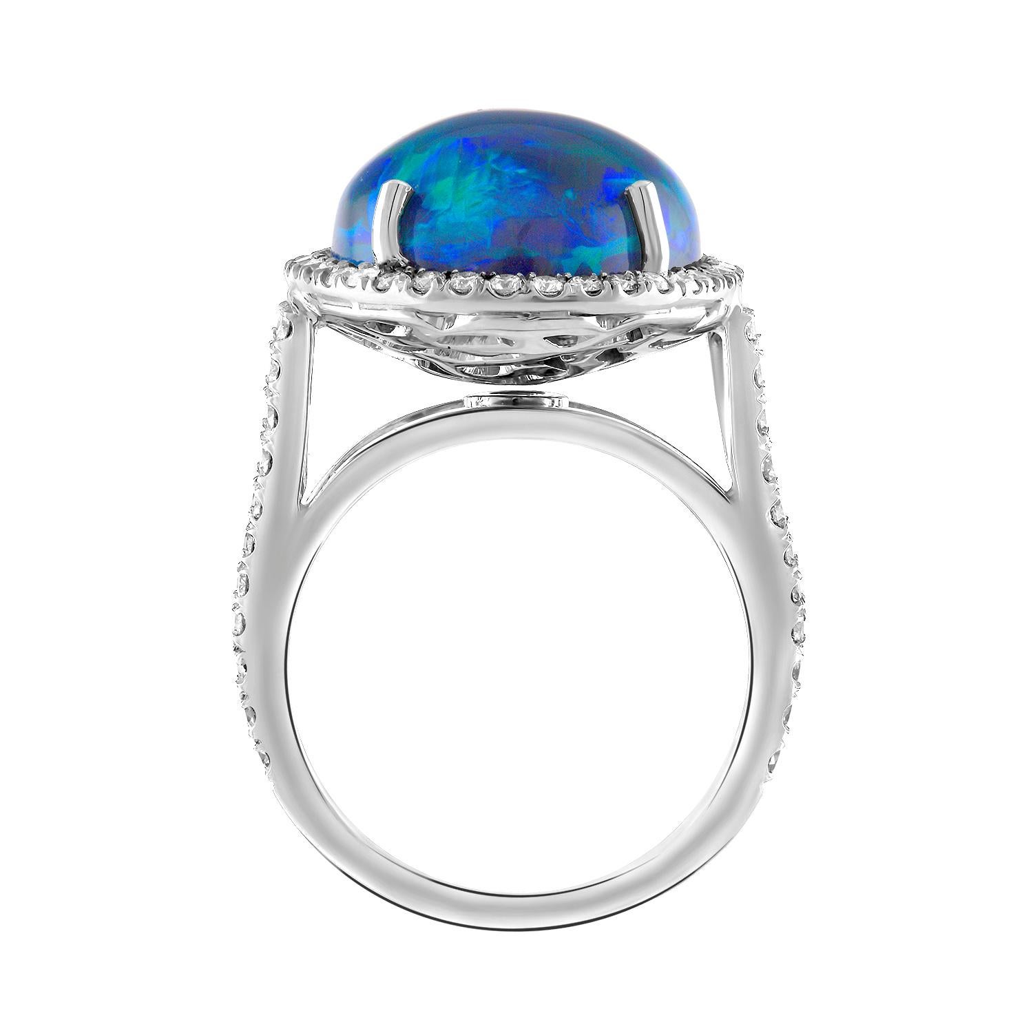 Shah & Shah's handmade platinum and 0.85 carat F/VS round brilliant cut diamond ring with a 12.31 carat Lightning Ridge Australian Black Opal.

The ring is a size 6.5. Initial sizing is complimentary and an insurance appraisal is included with your