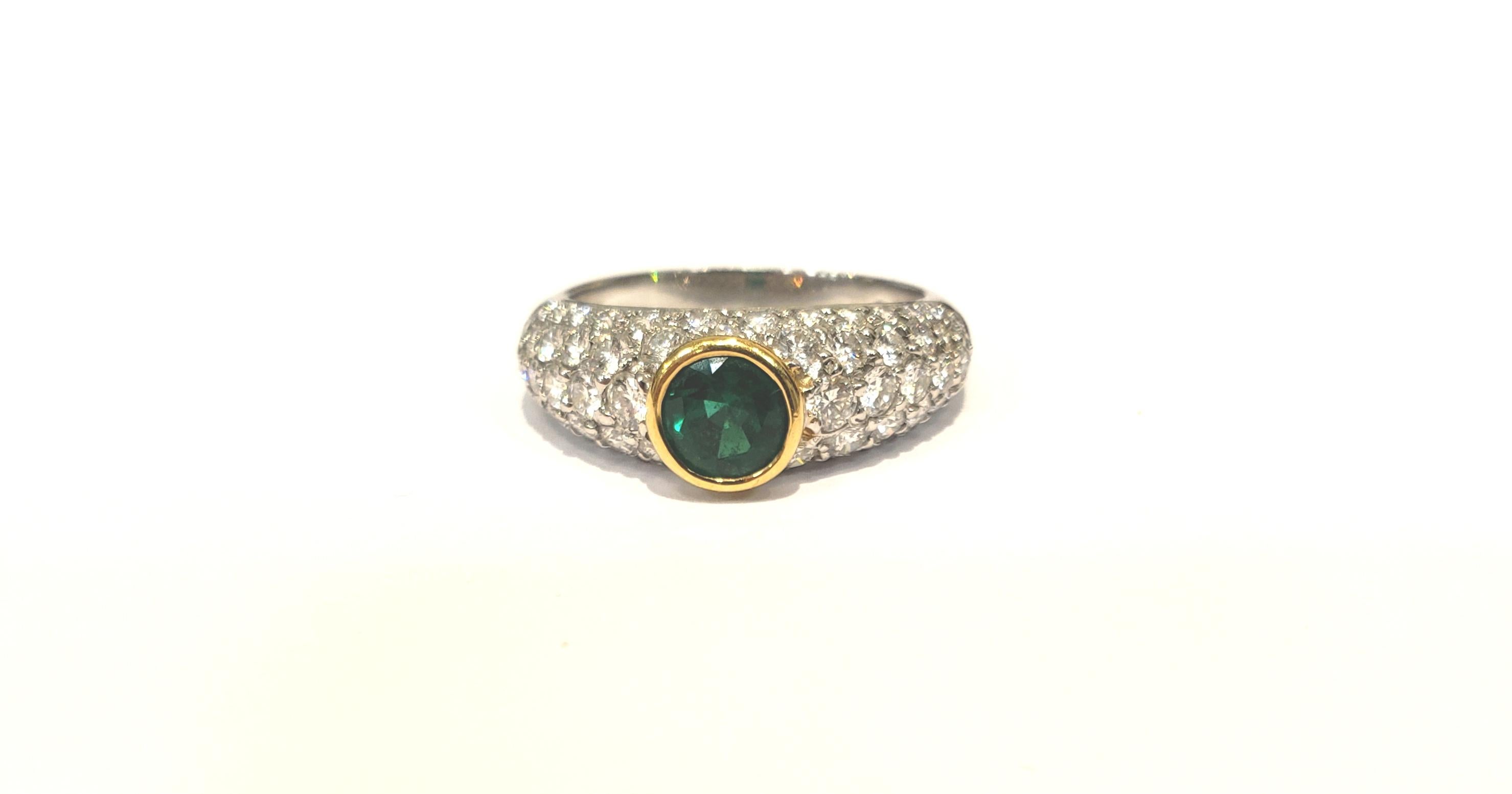 This Gorgeous Handmade Ring Is Done In Platinum, With A Faceted Round Emerald Bezel Set In 18 Karat Yellow Gold.
62 Round Brilliant Full Cut Diamonds Are Pave Set In Ring. Emerald Is 0.63 Carat. 62 Diamonds = 1.47 Carats
This Ring Is Beautiful On