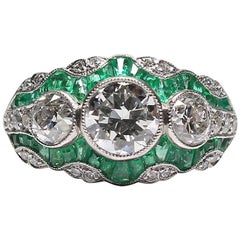 Handmade Platinum Contemporary 2.25 Carat Diamond and 2 Carat Emerald Ring