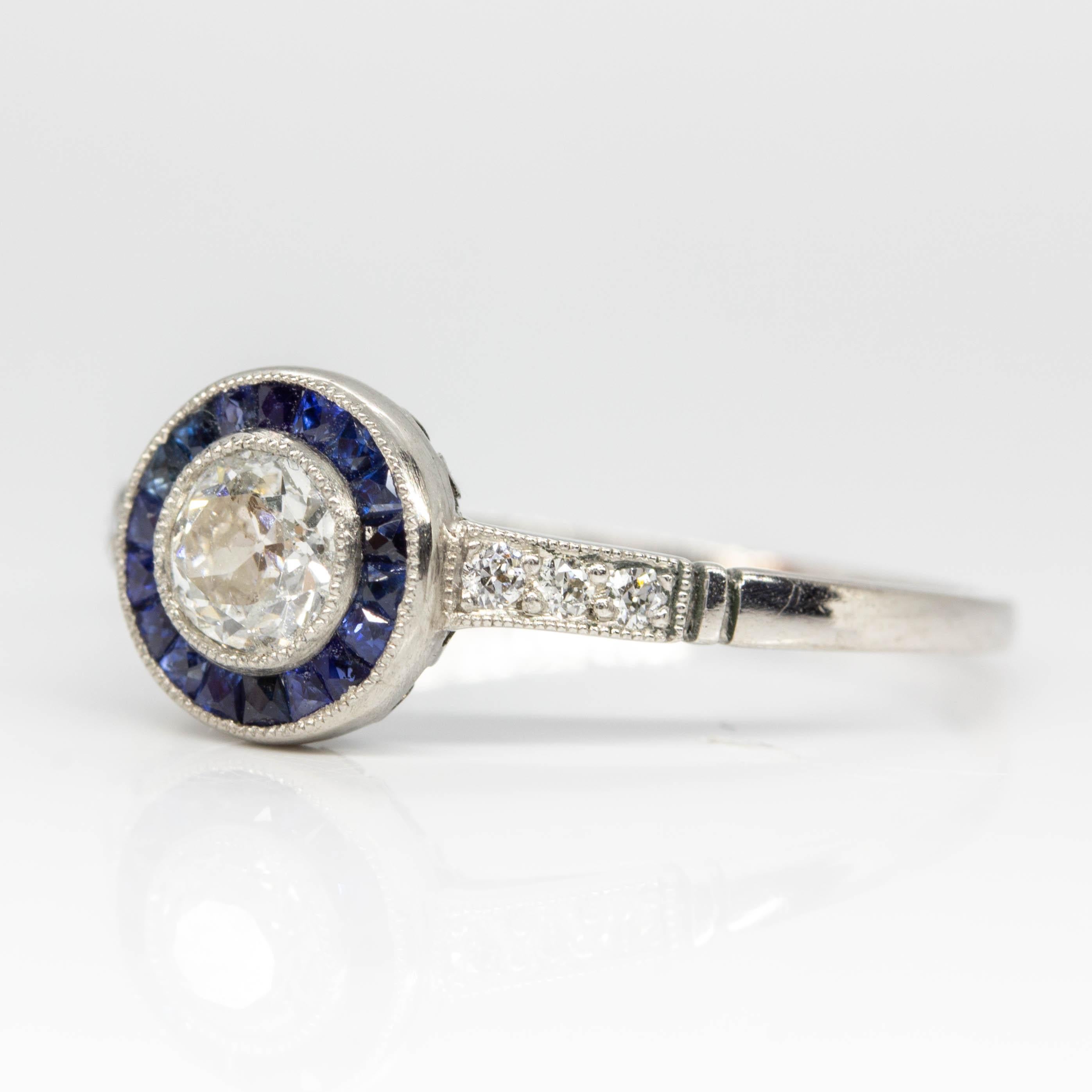 Old Mine Cut Handmade Platinum Diamonds and Sapphire Halo Ring For Sale