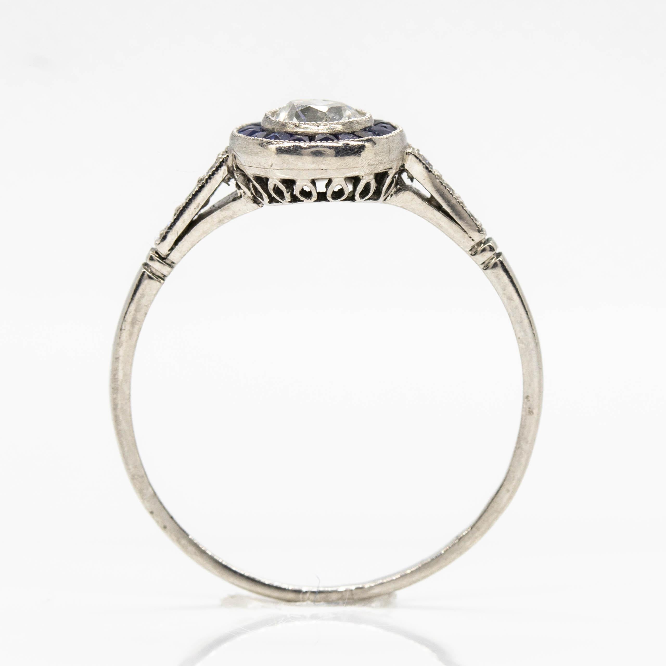 Handmade Platinum Diamonds and Sapphire Halo Ring In Excellent Condition For Sale In Miami, FL
