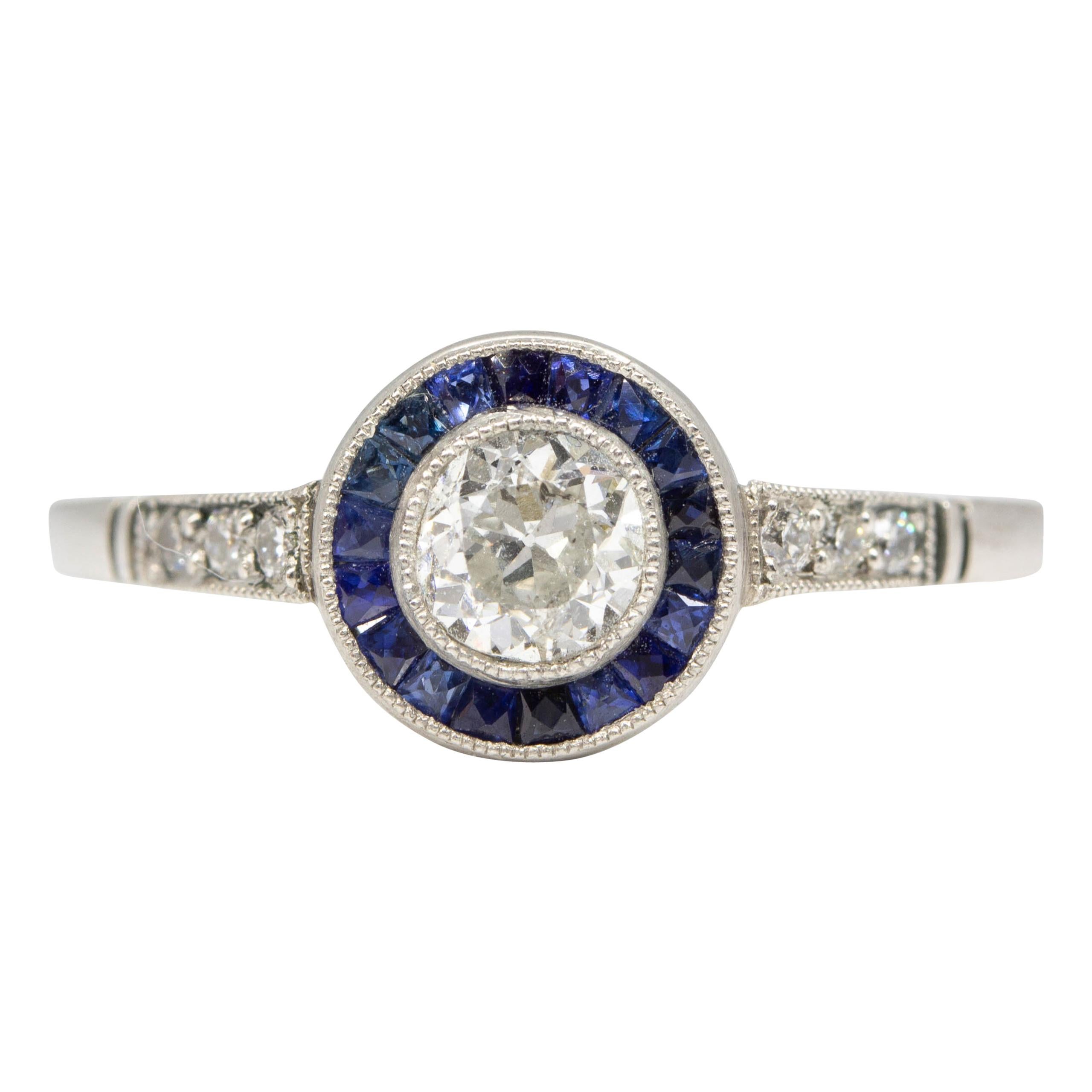 Handmade Platinum Diamonds and Sapphire Halo Ring For Sale