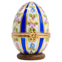 Vintage handmade porcelain egg-shaped clock