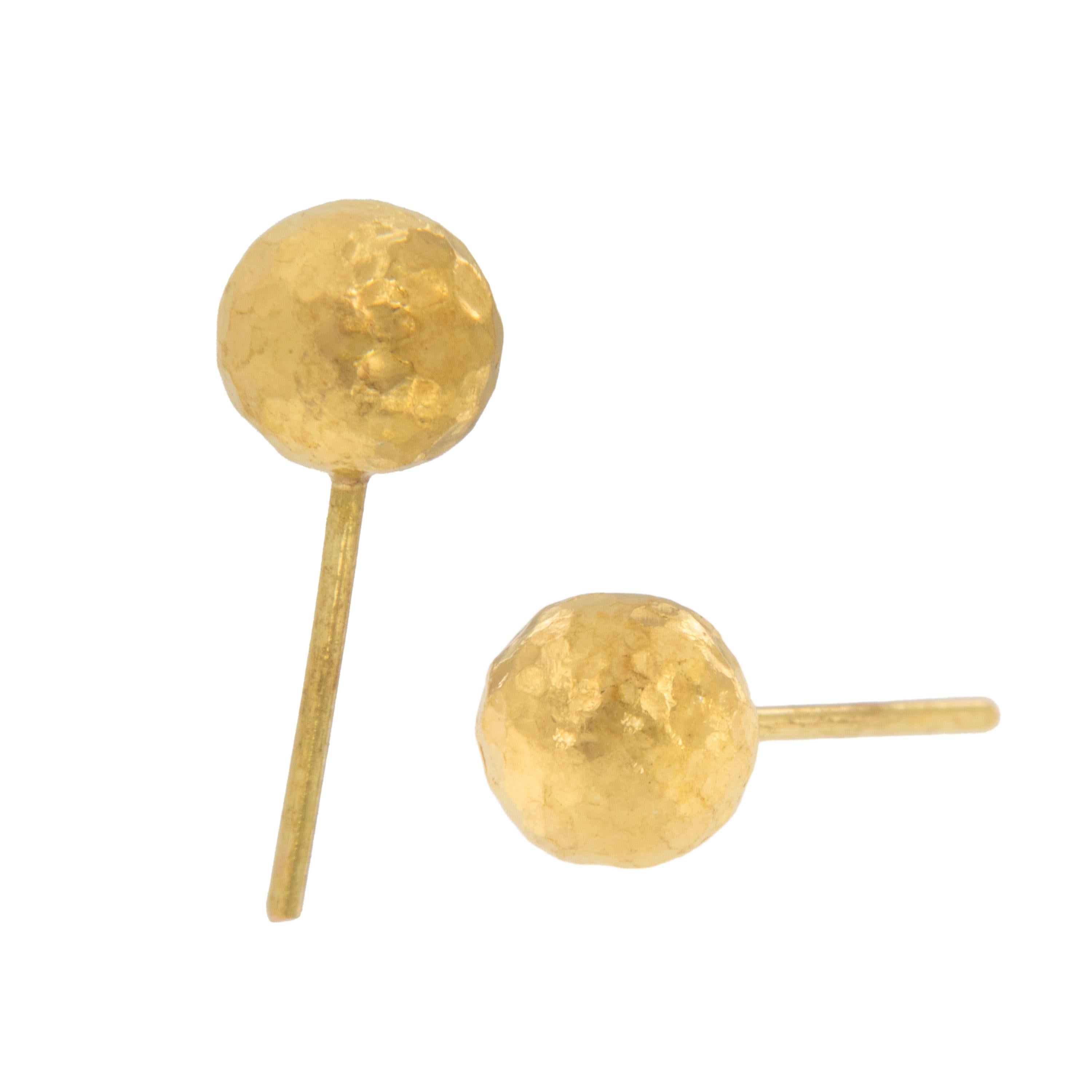 Rarest of all the golds, 24 karat gold has a distinct, rich color valued by investors worldwide, which is further enhanced by the hammered finish for a fun look. These classic 7.5mm ball stud earrings are pierced with 18 KYG friction backs for