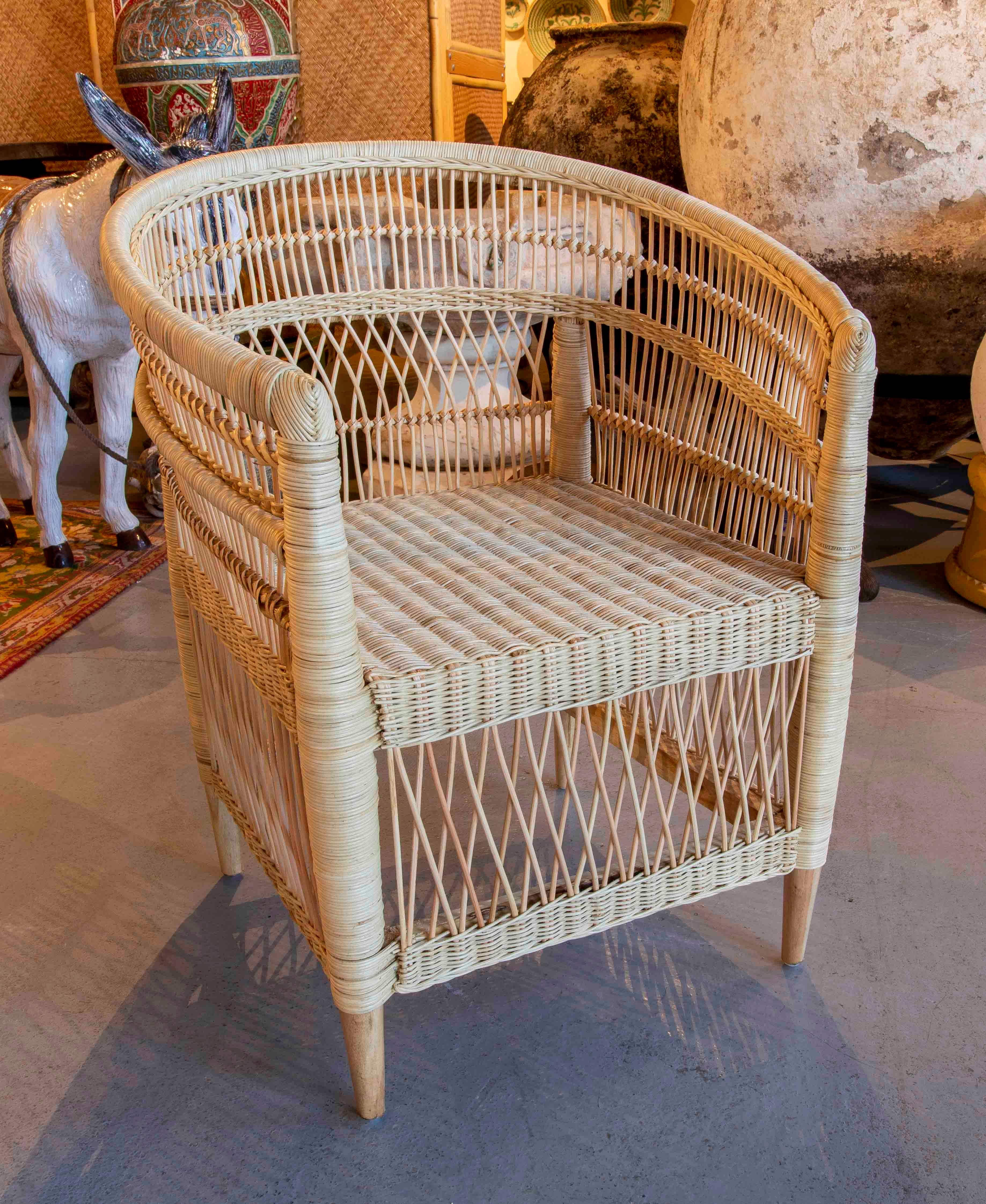 Handmade Rattan Armchair with Wooden Legs For Sale 6