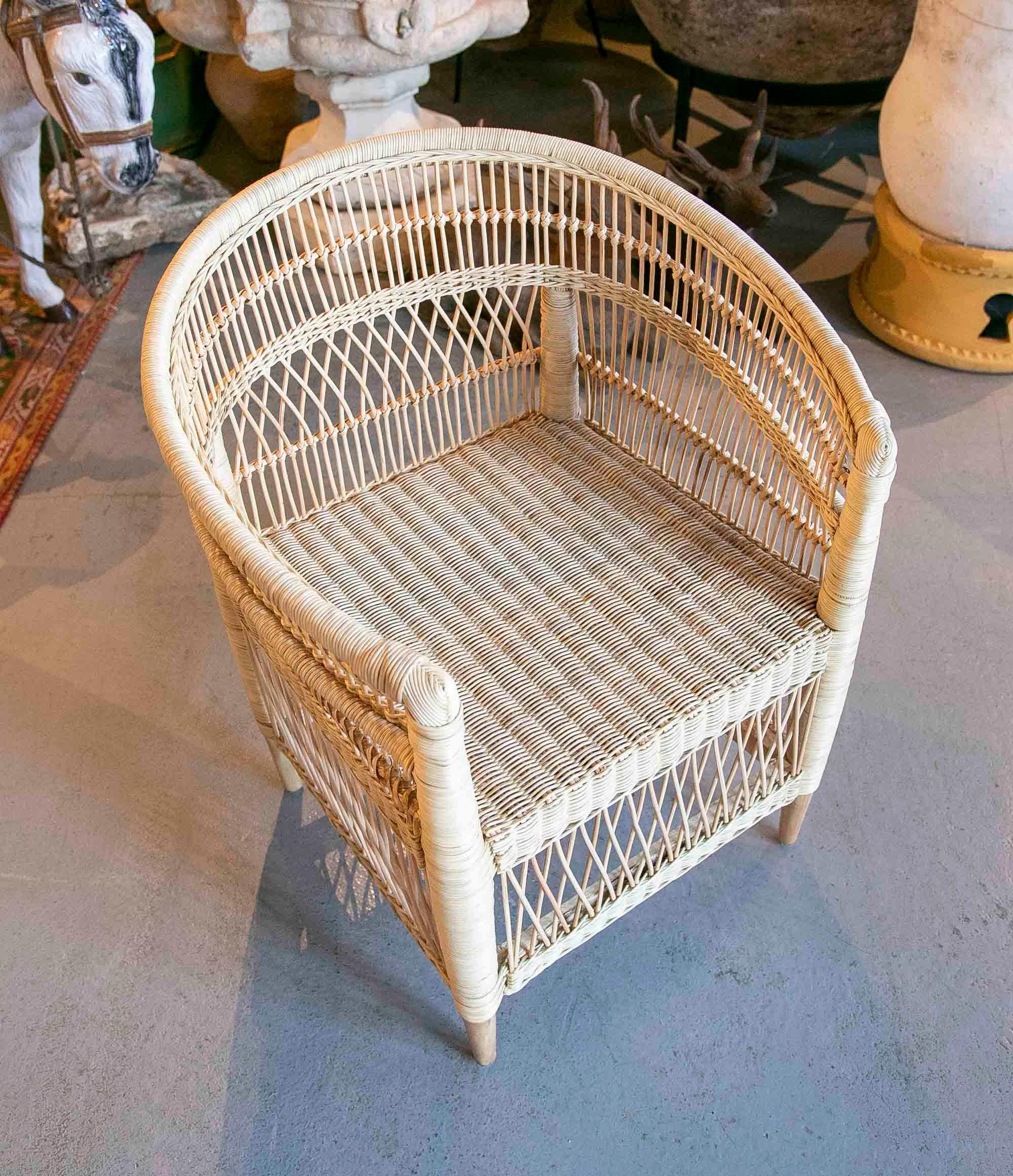 Handmade Rattan Armchair with Wooden Legs For Sale 7