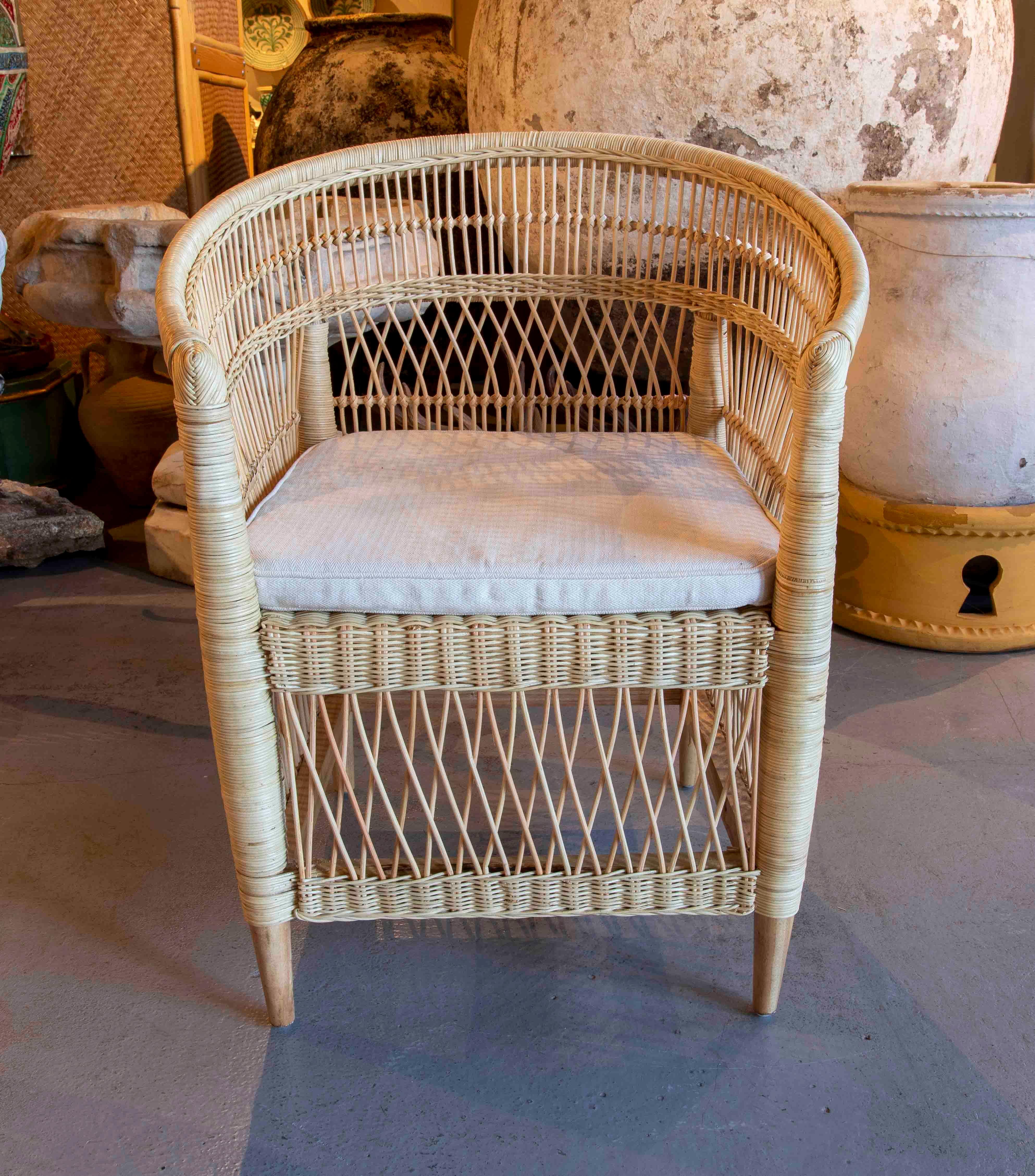 European Handmade Rattan Armchair with Wooden Legs For Sale