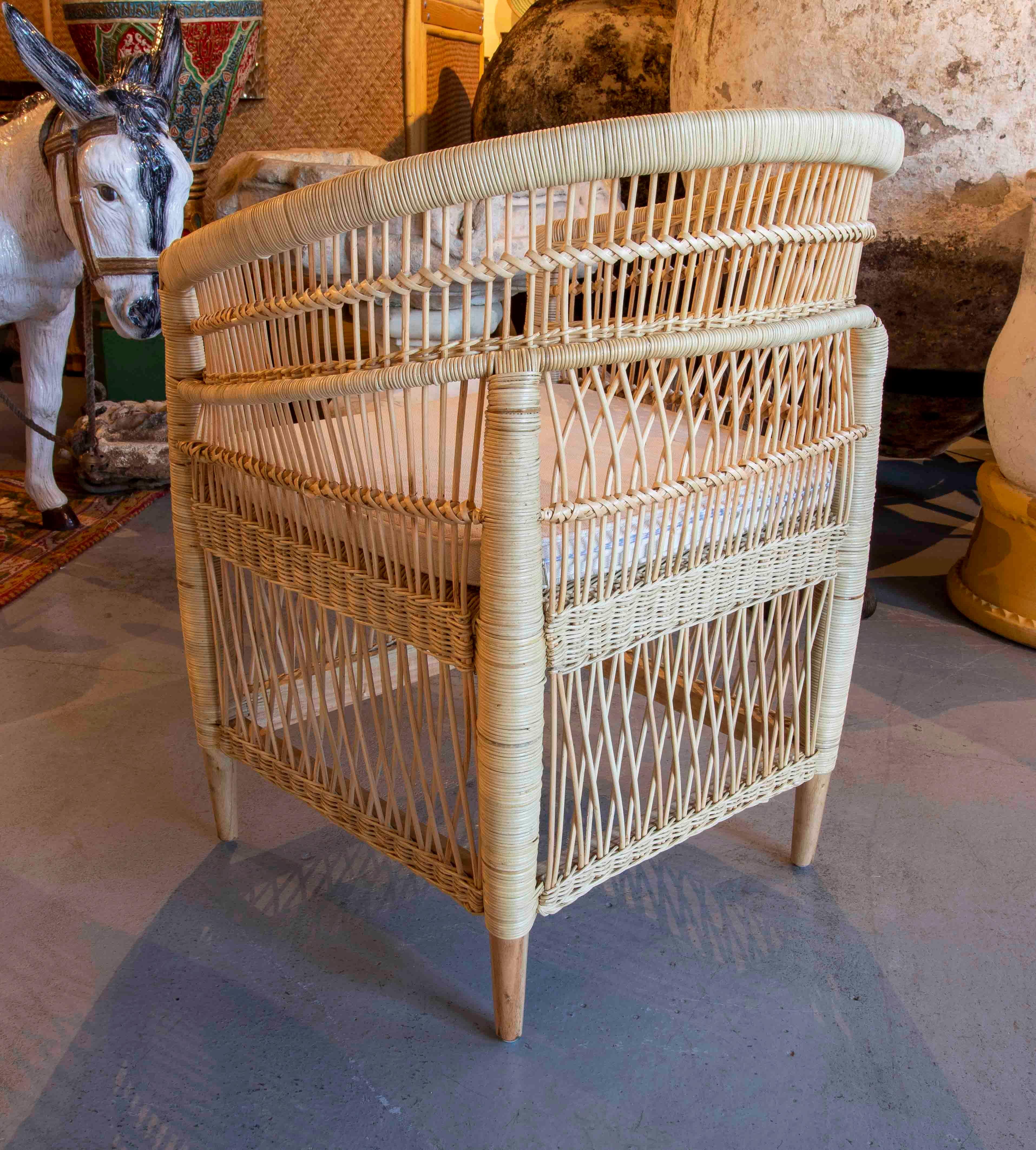 Handmade Rattan Armchair with Wooden Legs For Sale 1