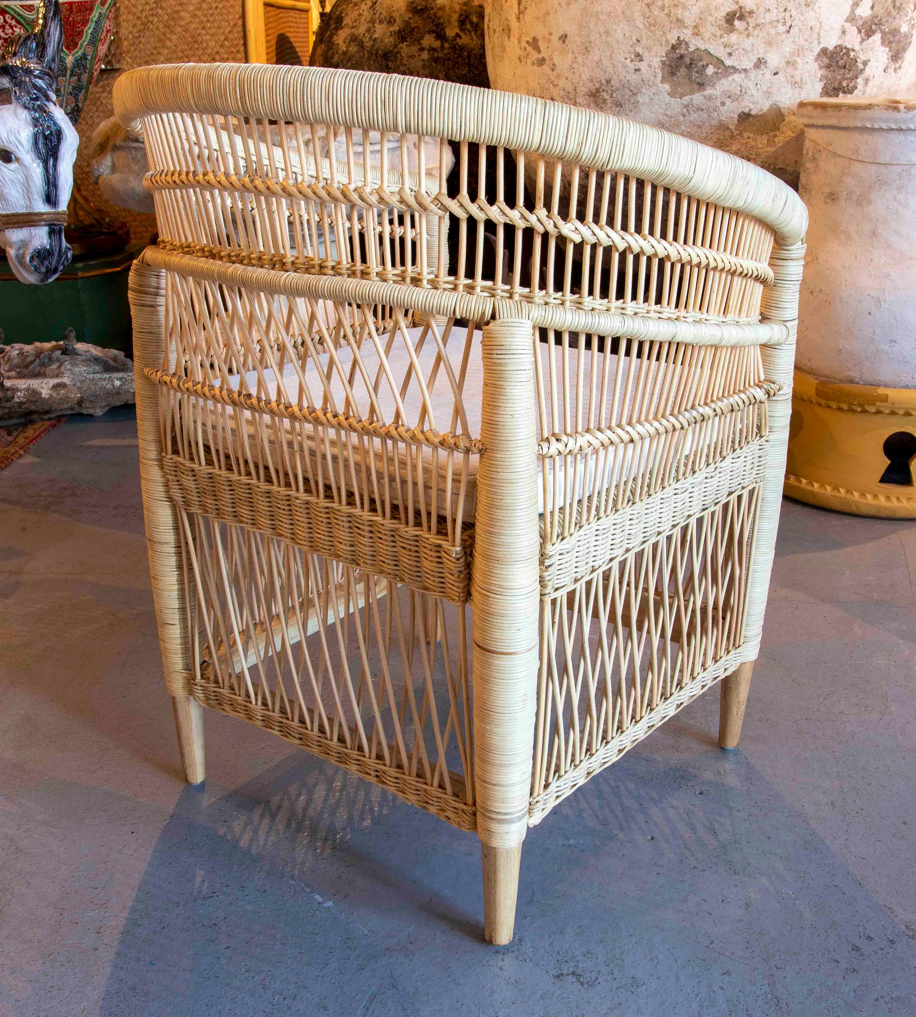 Handmade Rattan Armchair with Wooden Legs For Sale 3