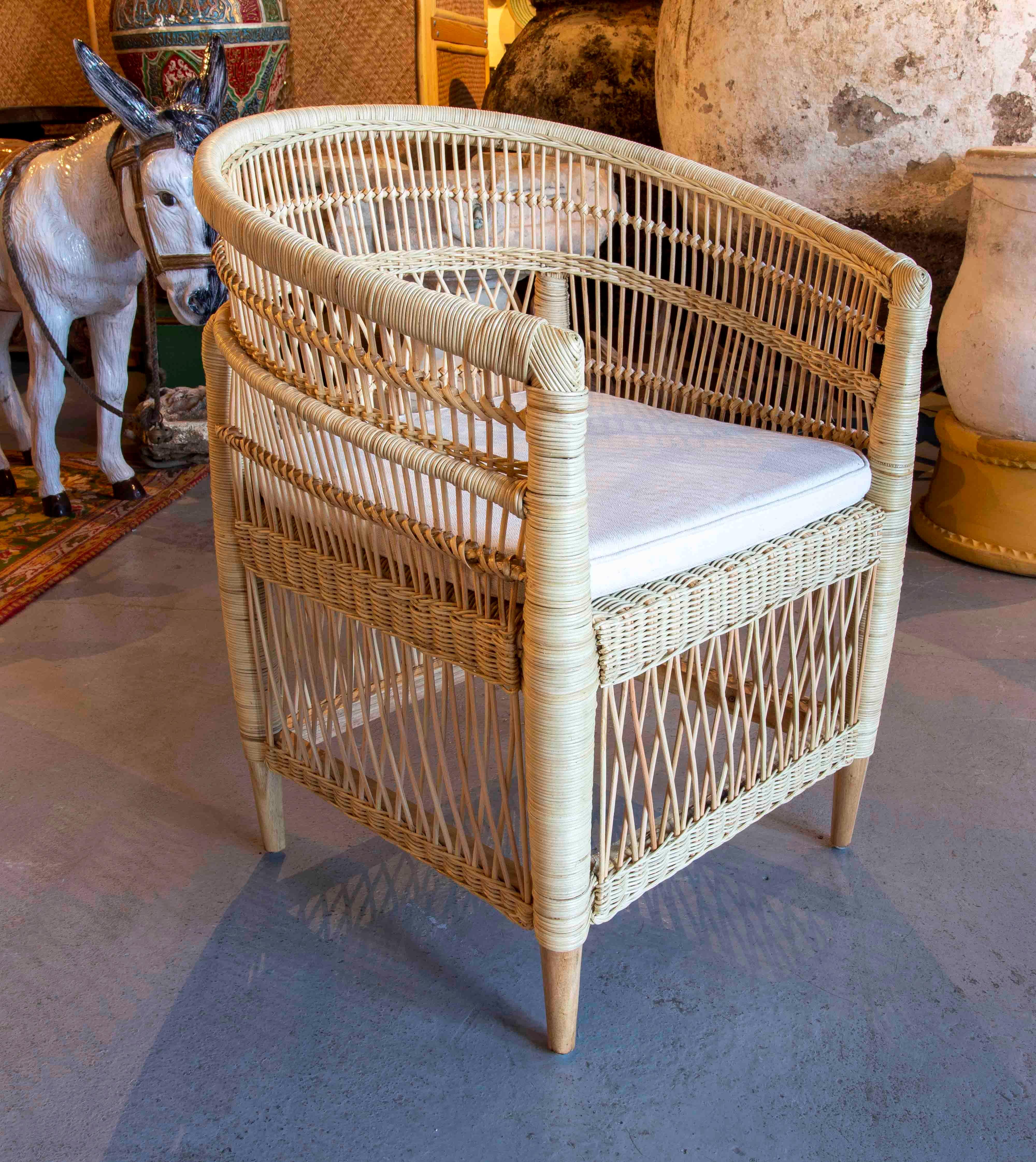 Handmade Rattan Armchair with Wooden Legs For Sale 5