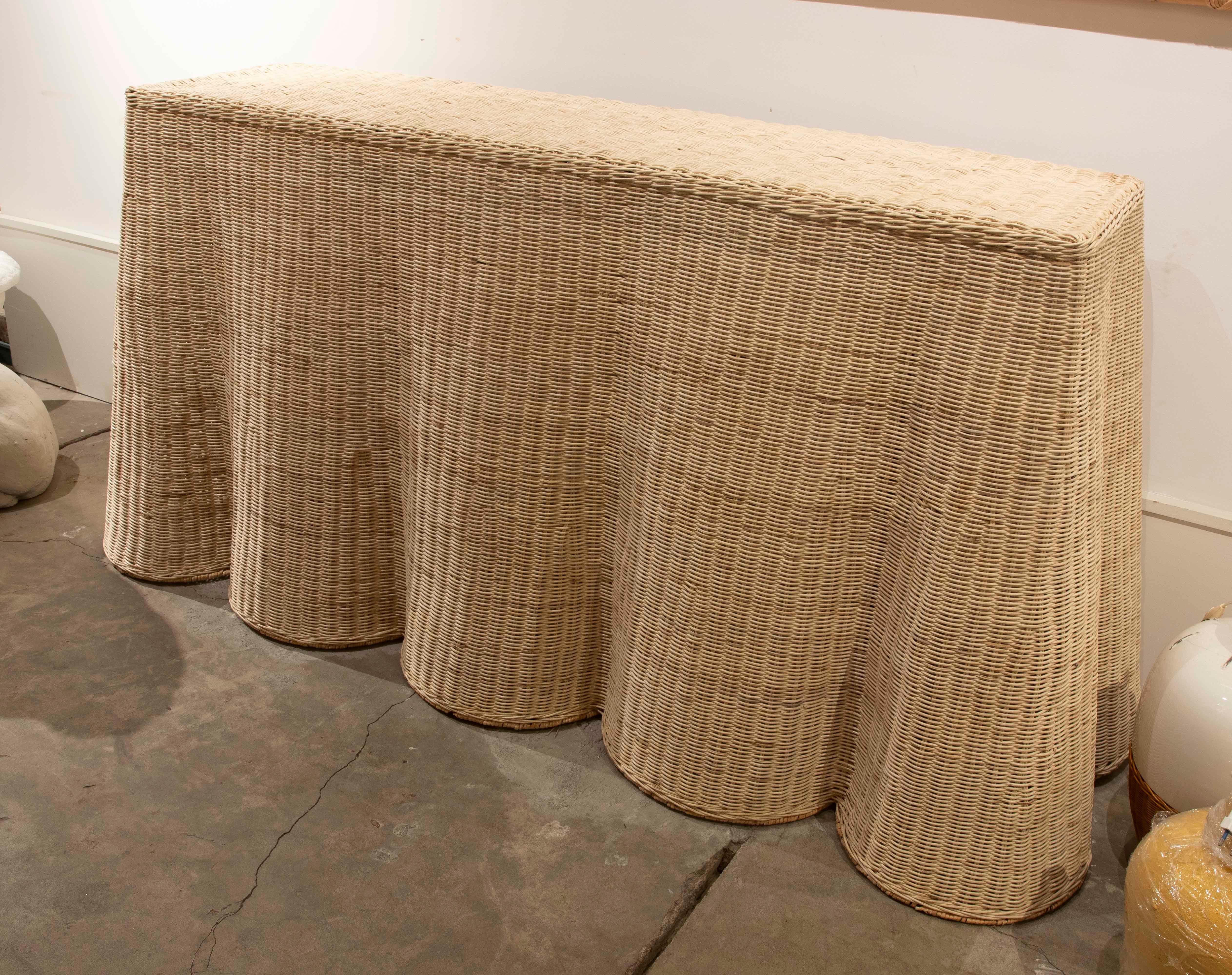 Handmade Rattan Console with iron Frame.

The upper part has the following dimensions: 100x30x70cm